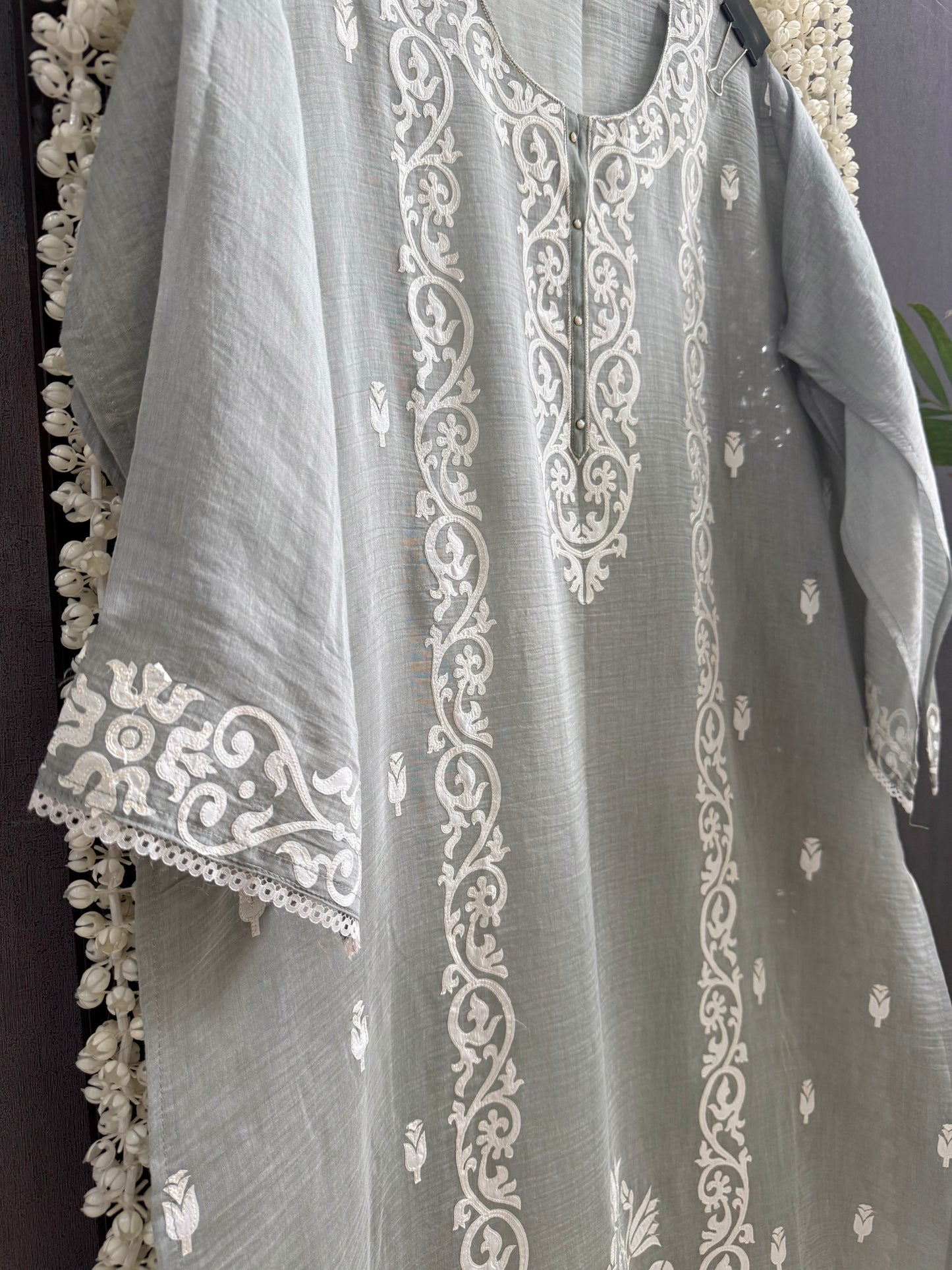 Luxurious Mul chanderi appliqué work suit