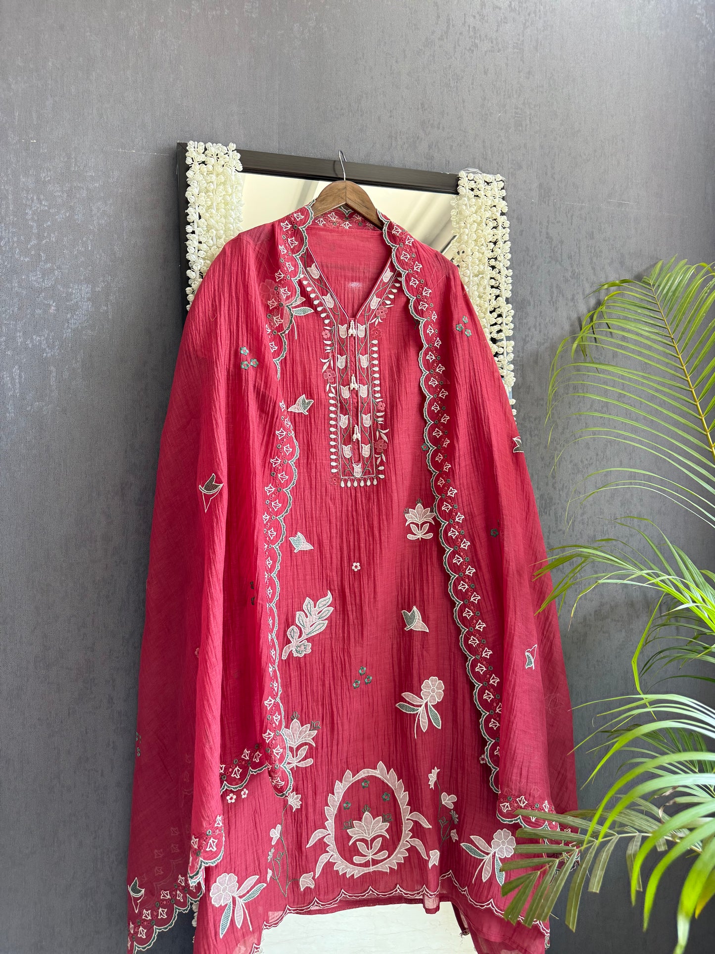 Luxurious Mul chanderi appliqué work suit