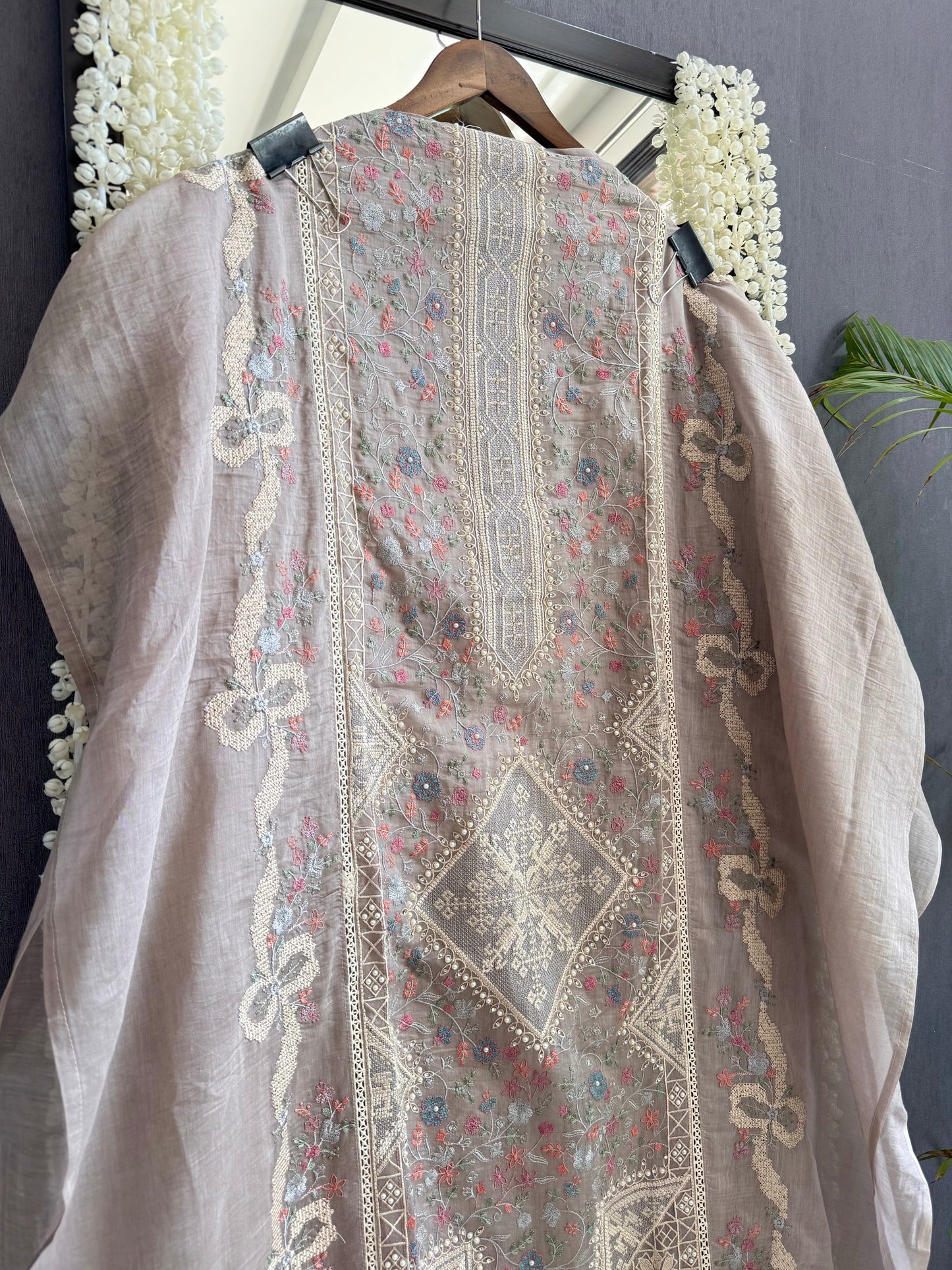 Luxurious Mul chanderi bow crossstitch suit