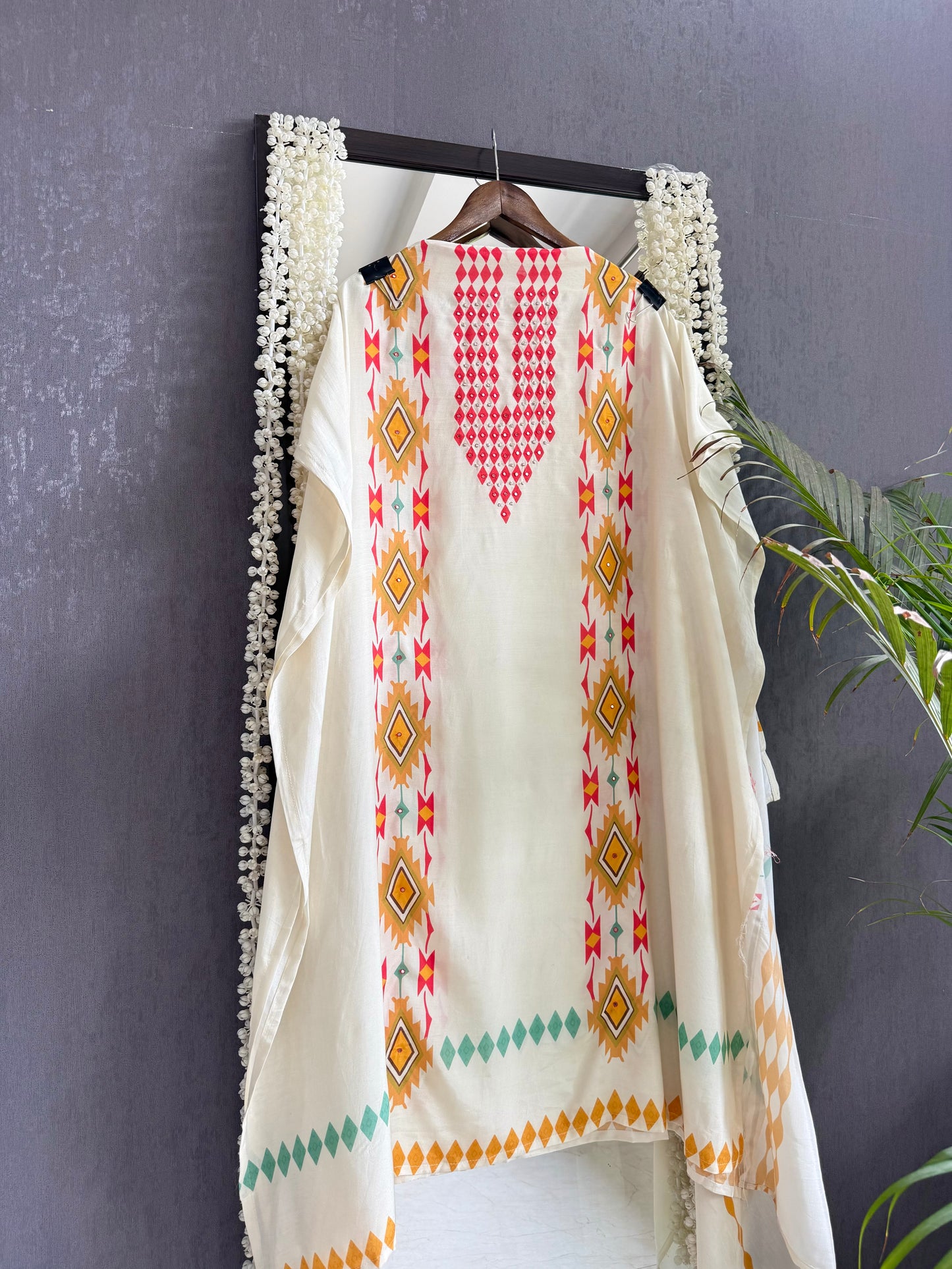 Muslin ikkat inspired handwork suits