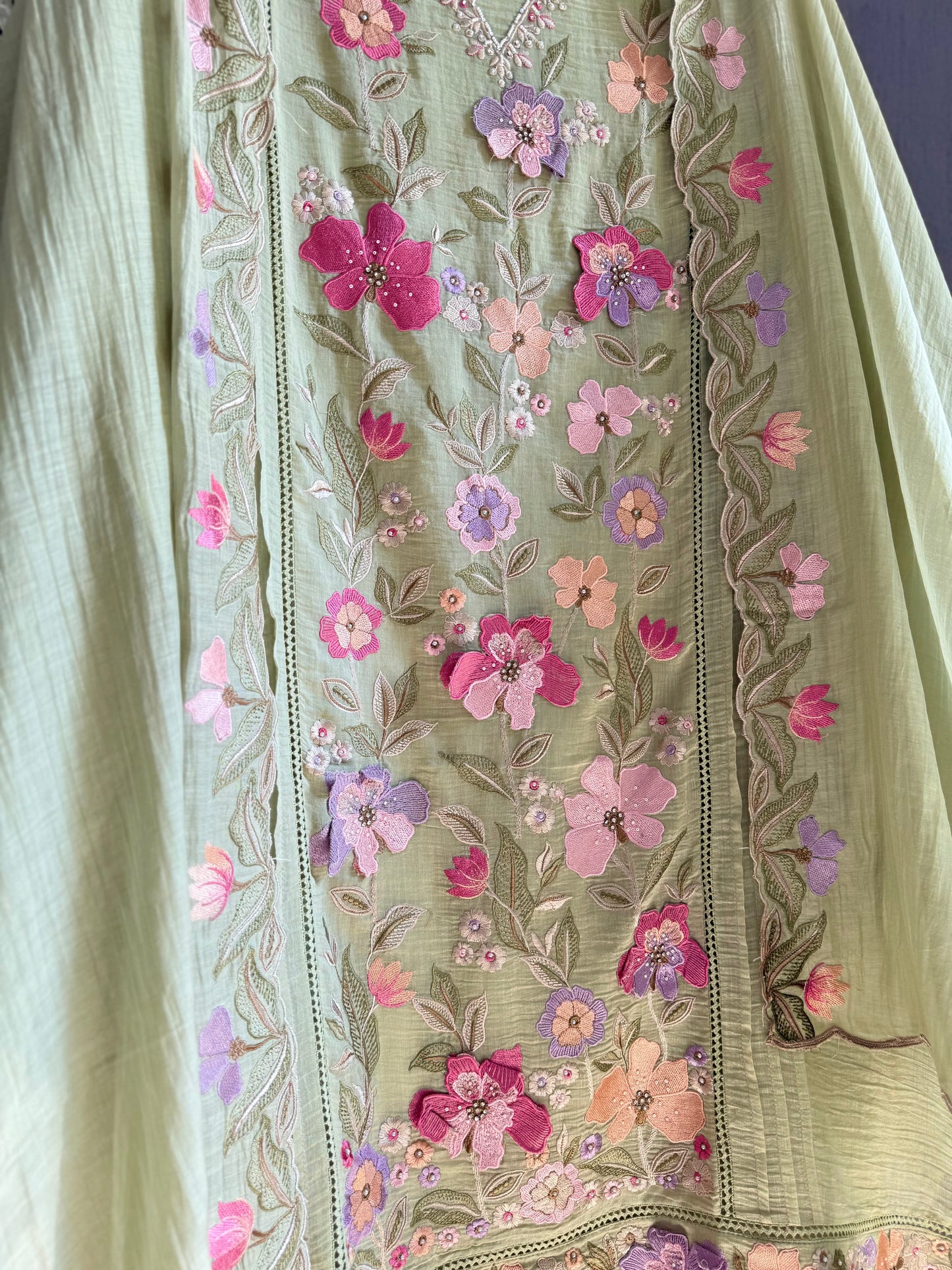 Luxurious Mul chanderi appliqué work floral suit