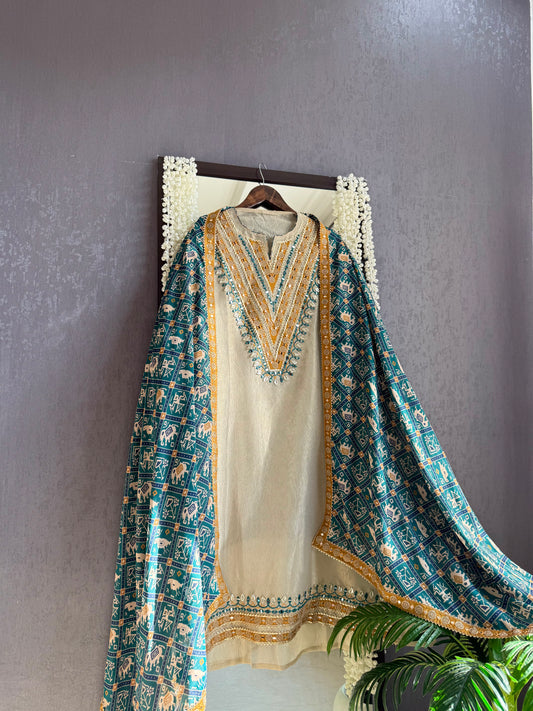 Luxurious patola crush tissue silk suit