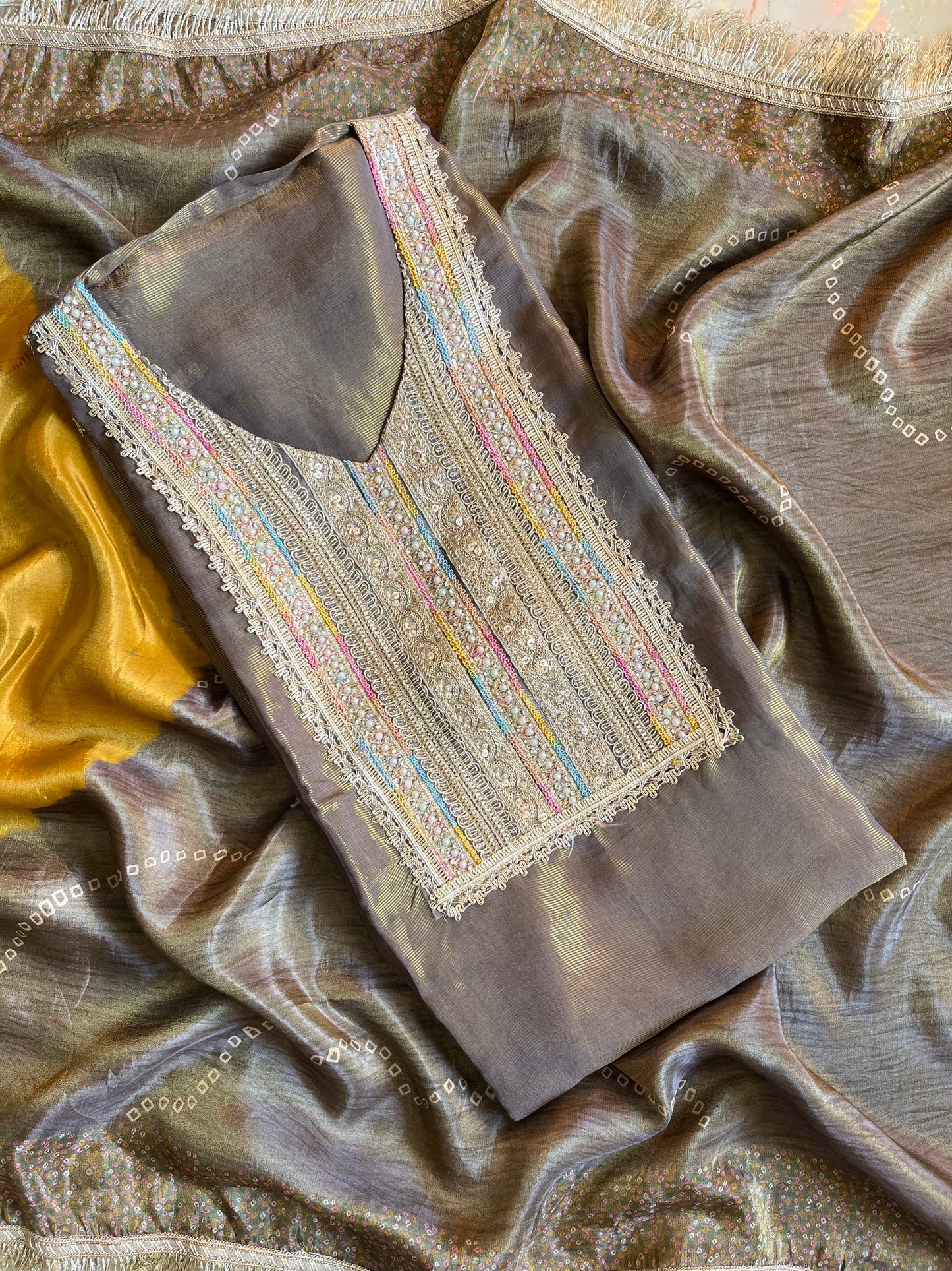 Luxurious zari woven tissue silk suit