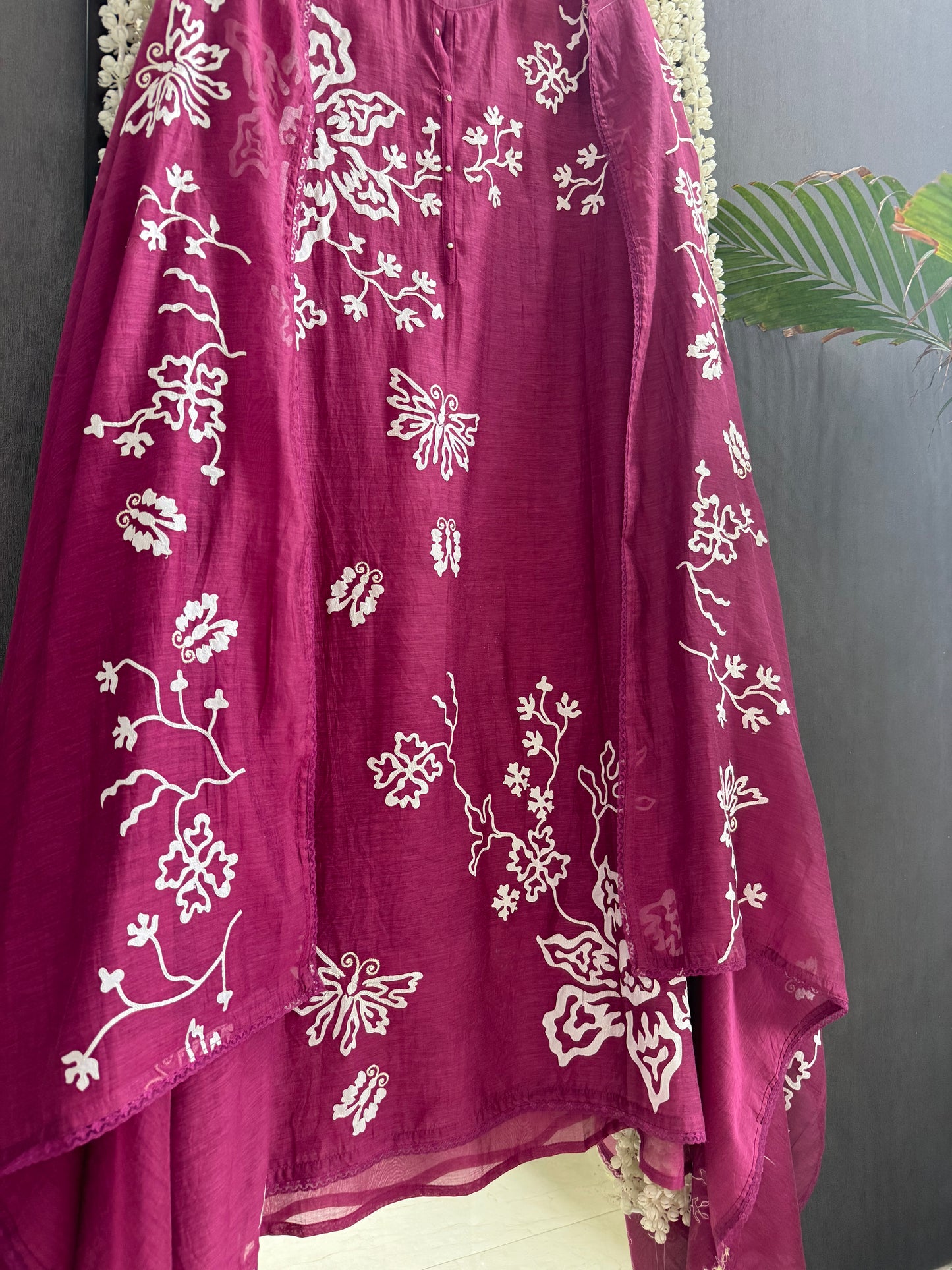 Luxurious Mul chanderi appliqué butterfly suit