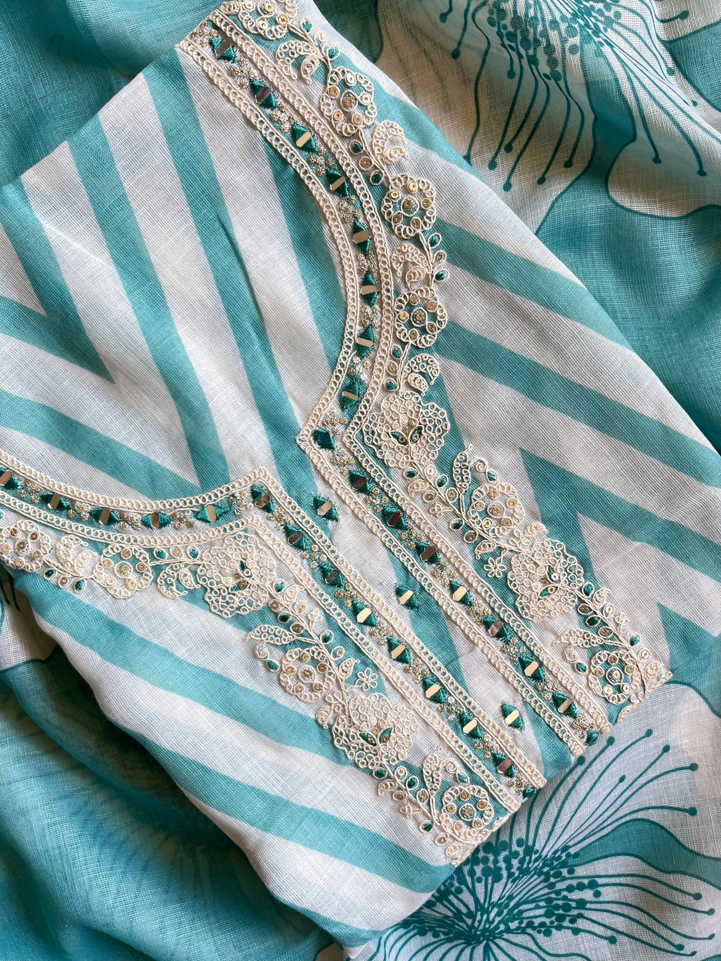 Aari work premium linen suits