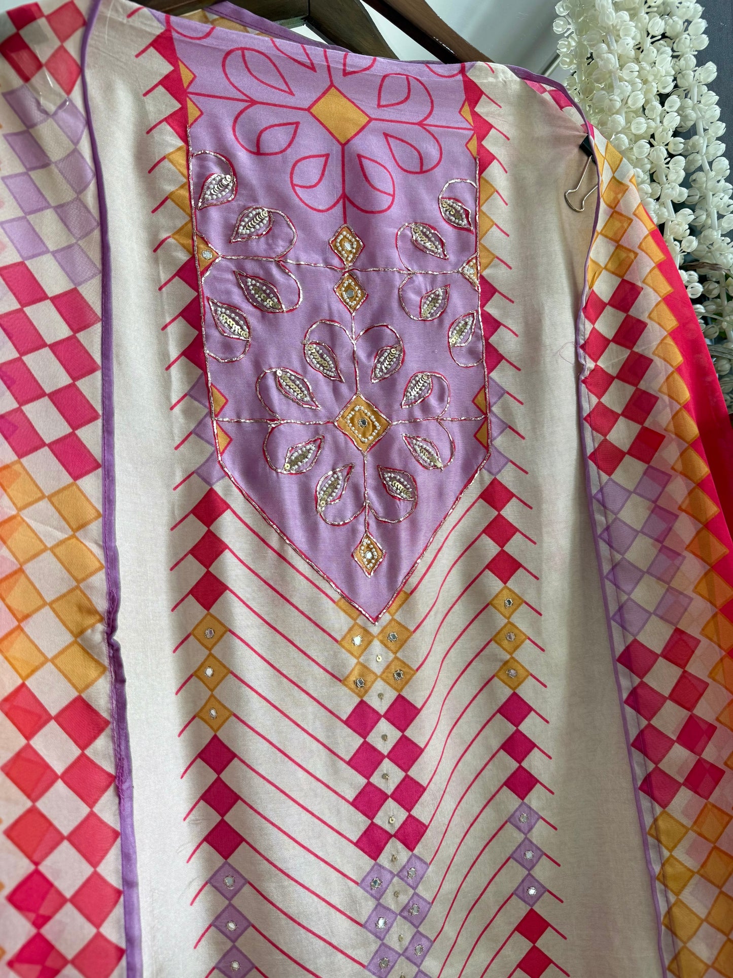 Muslin ikkat inspired handwork suits