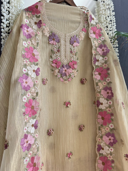 Luxurious Mul chanderi appliqué work floral suit