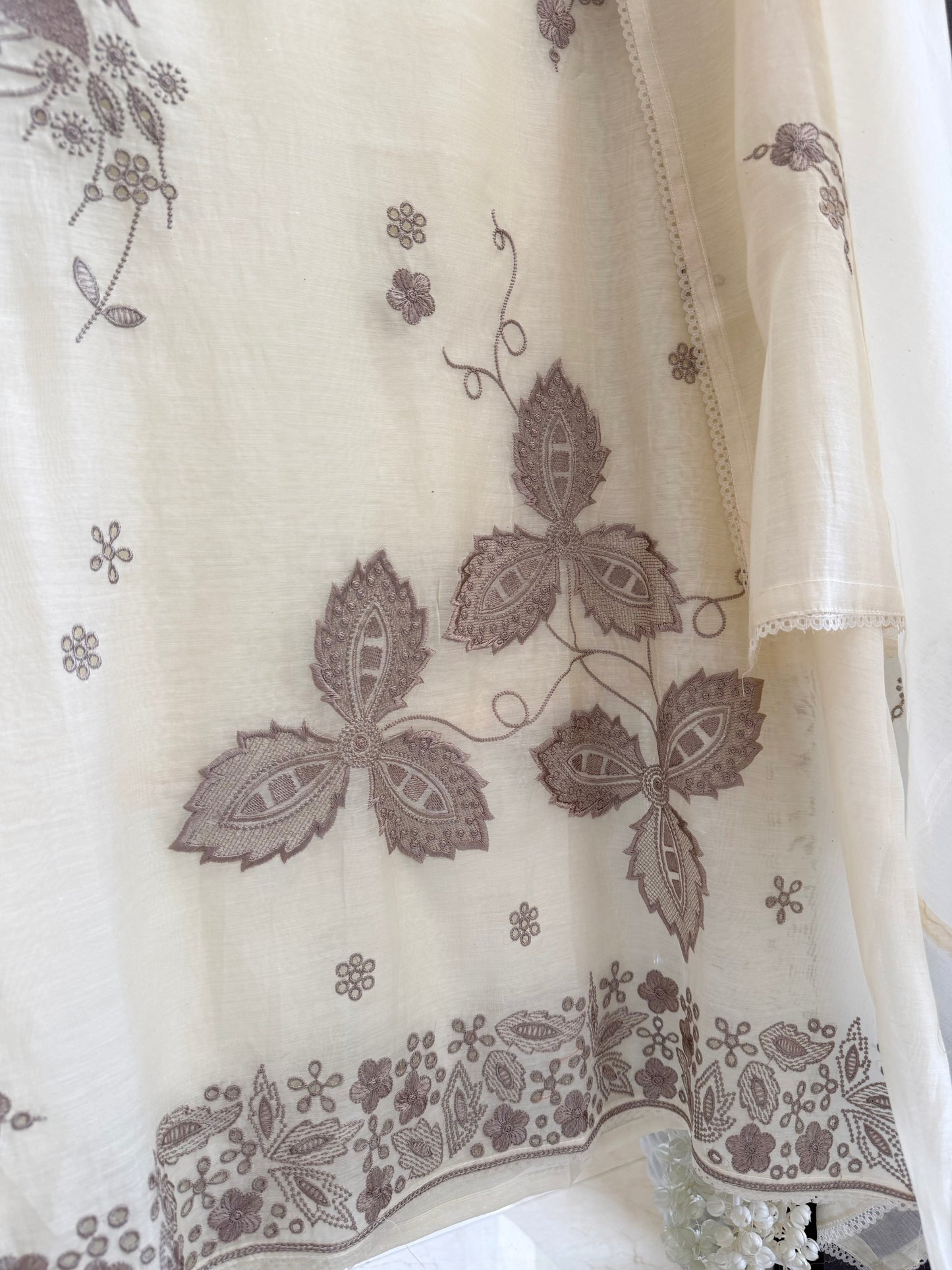 Luxurious Mul chanderi threadwork schiffili suit