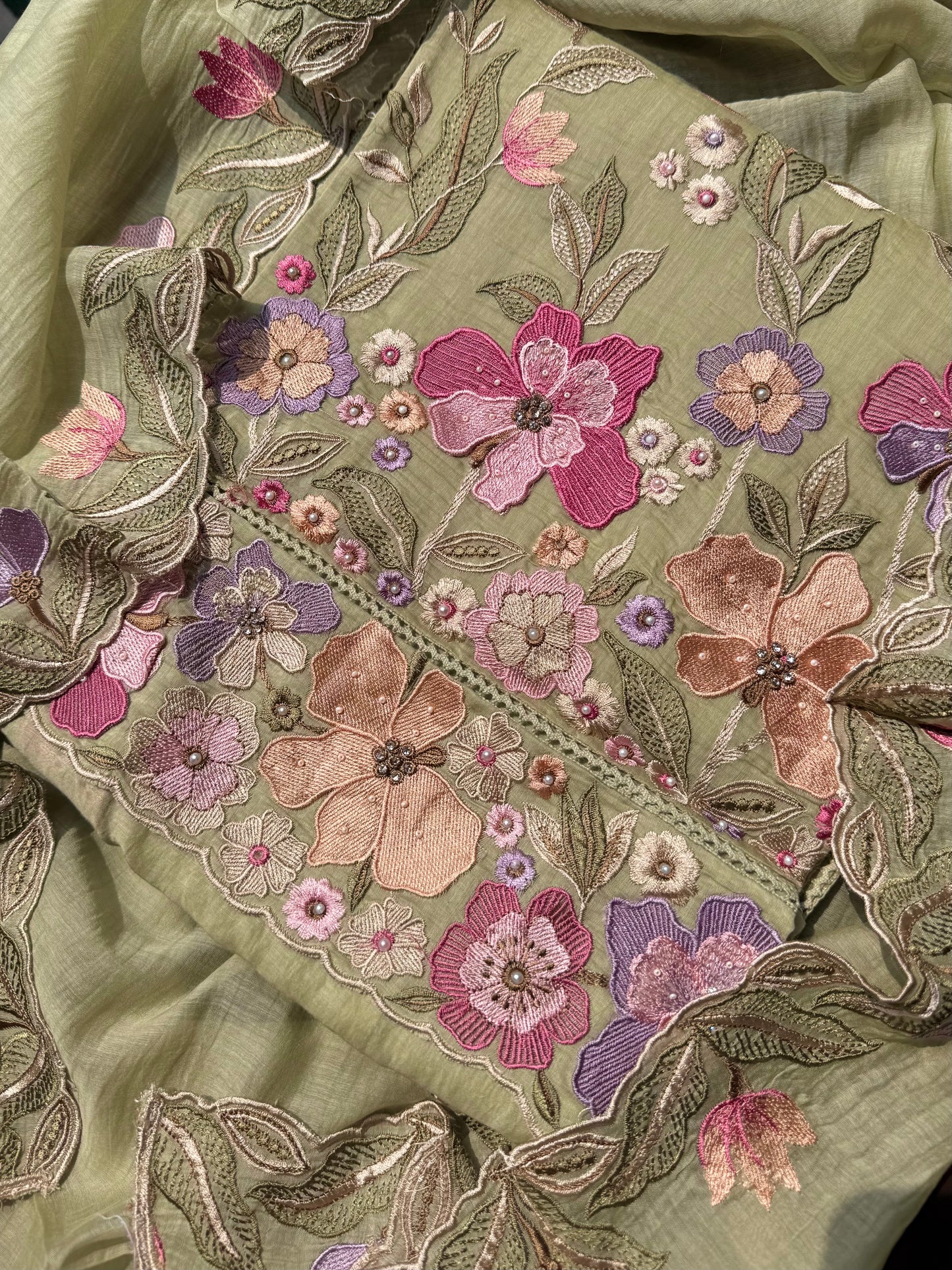 Luxurious Mul chanderi appliqué work floral suit