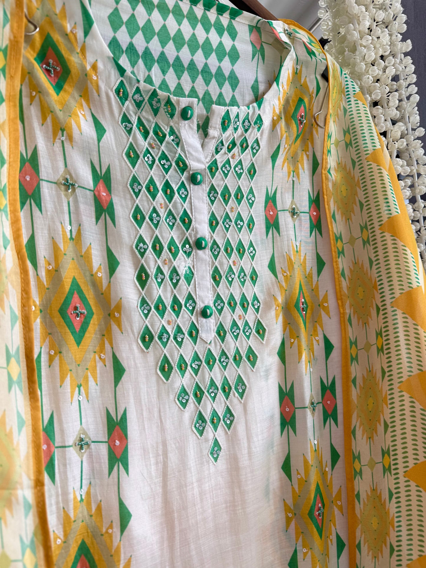 Muslin ikkat inspired handwork suits