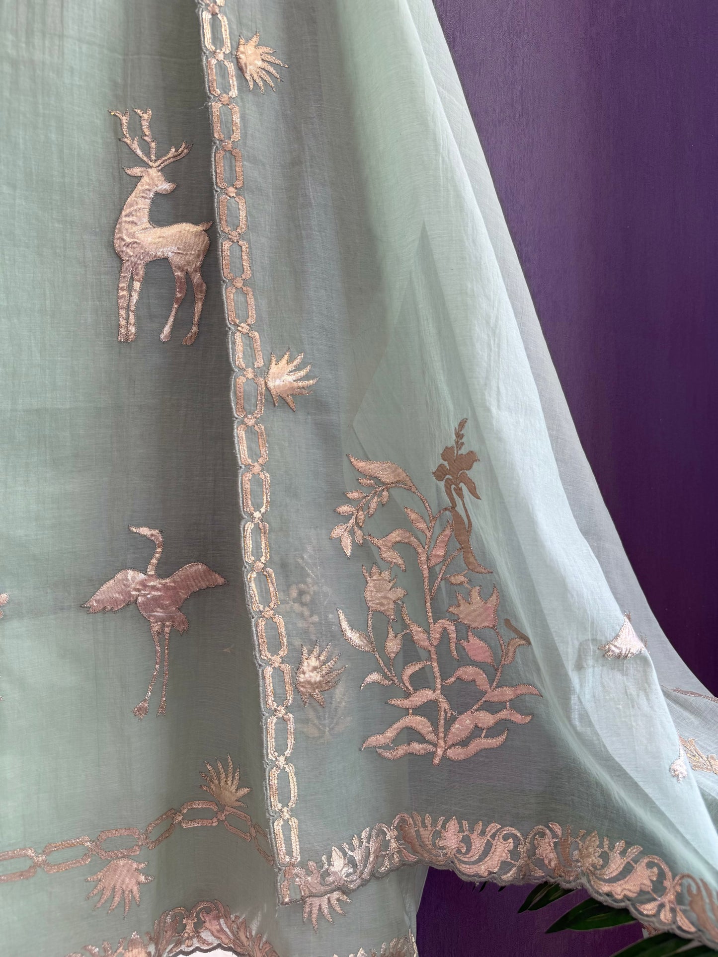 Luxurious Mul chanderi appliqué work suit