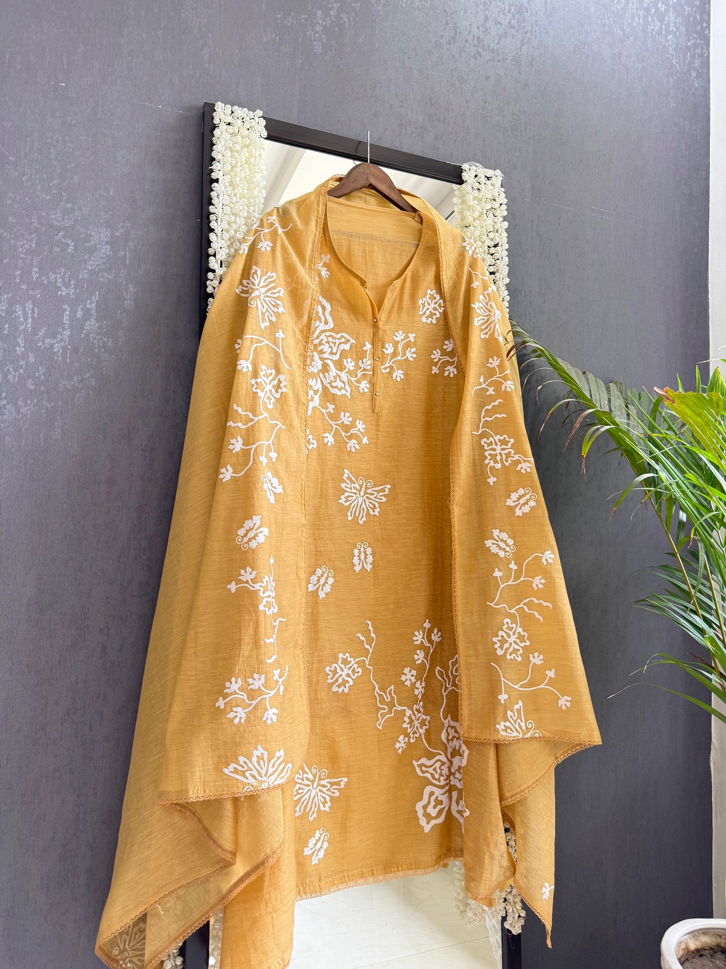 Luxurious Mul chanderi appliqué butterfly suit
