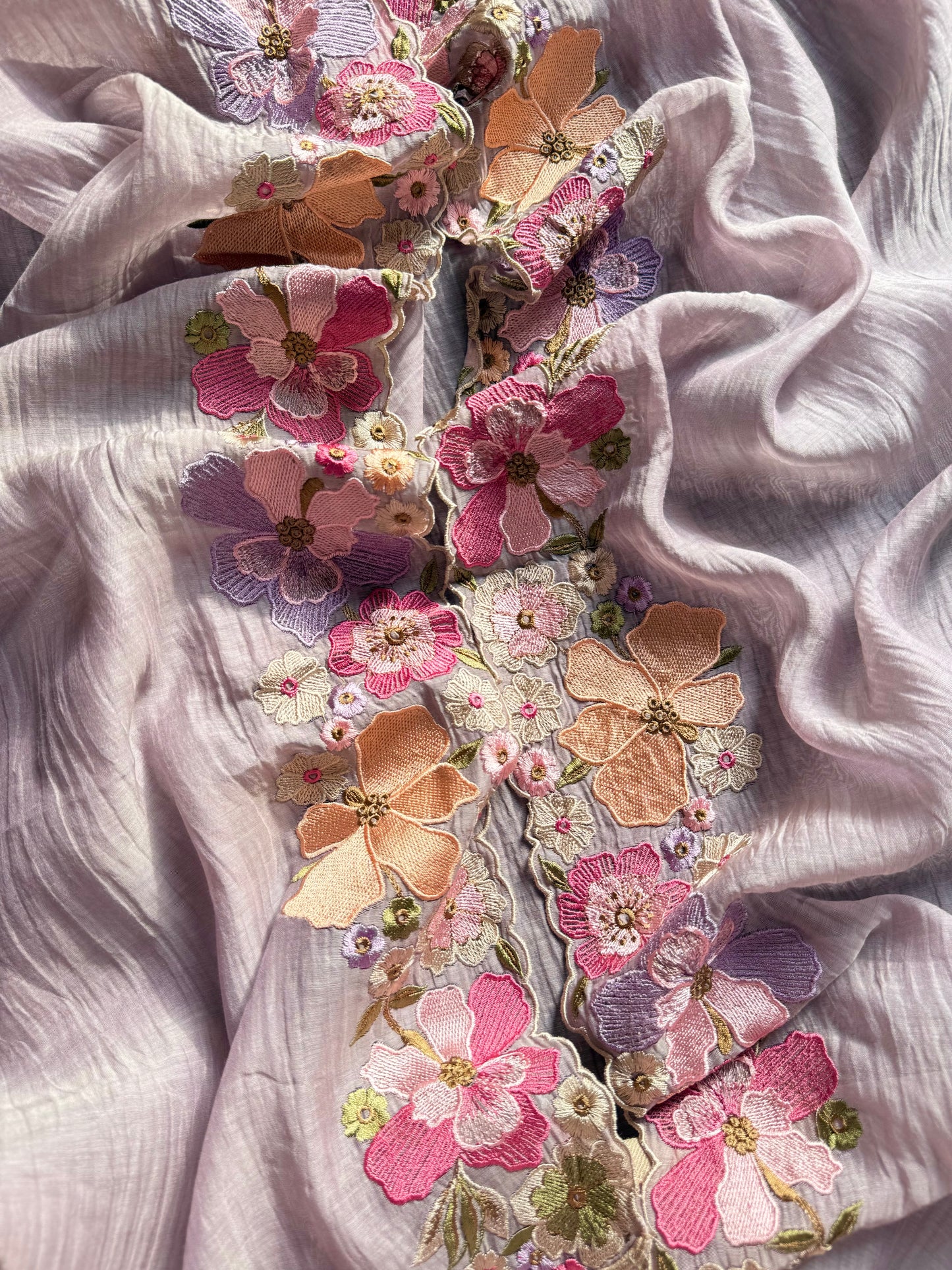 Luxurious Mul chanderi appliqué work floral suit