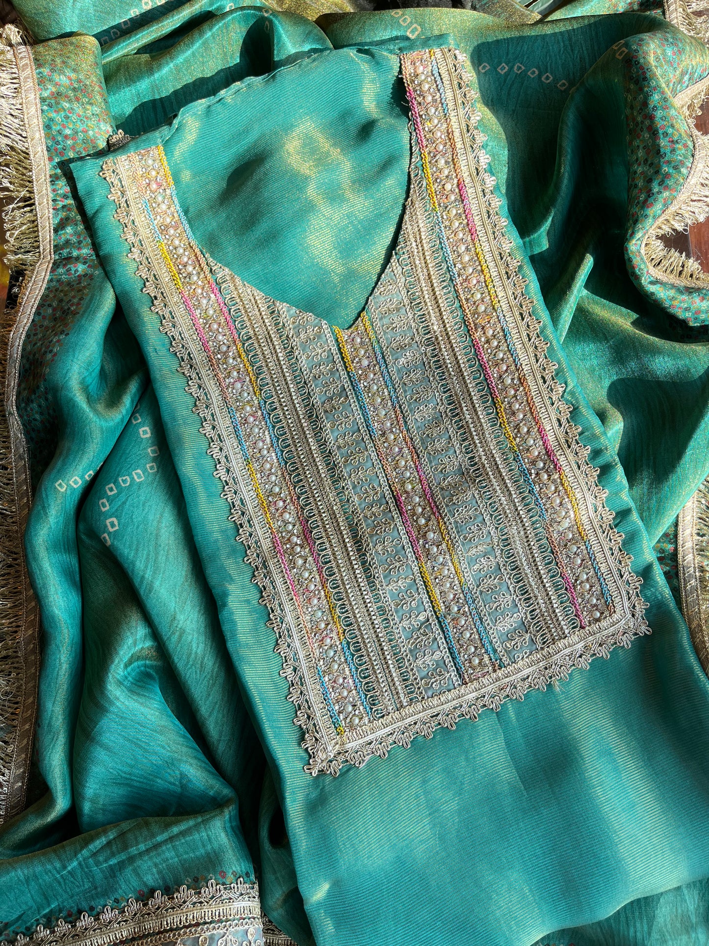 Luxurious zari woven tissue silk suit