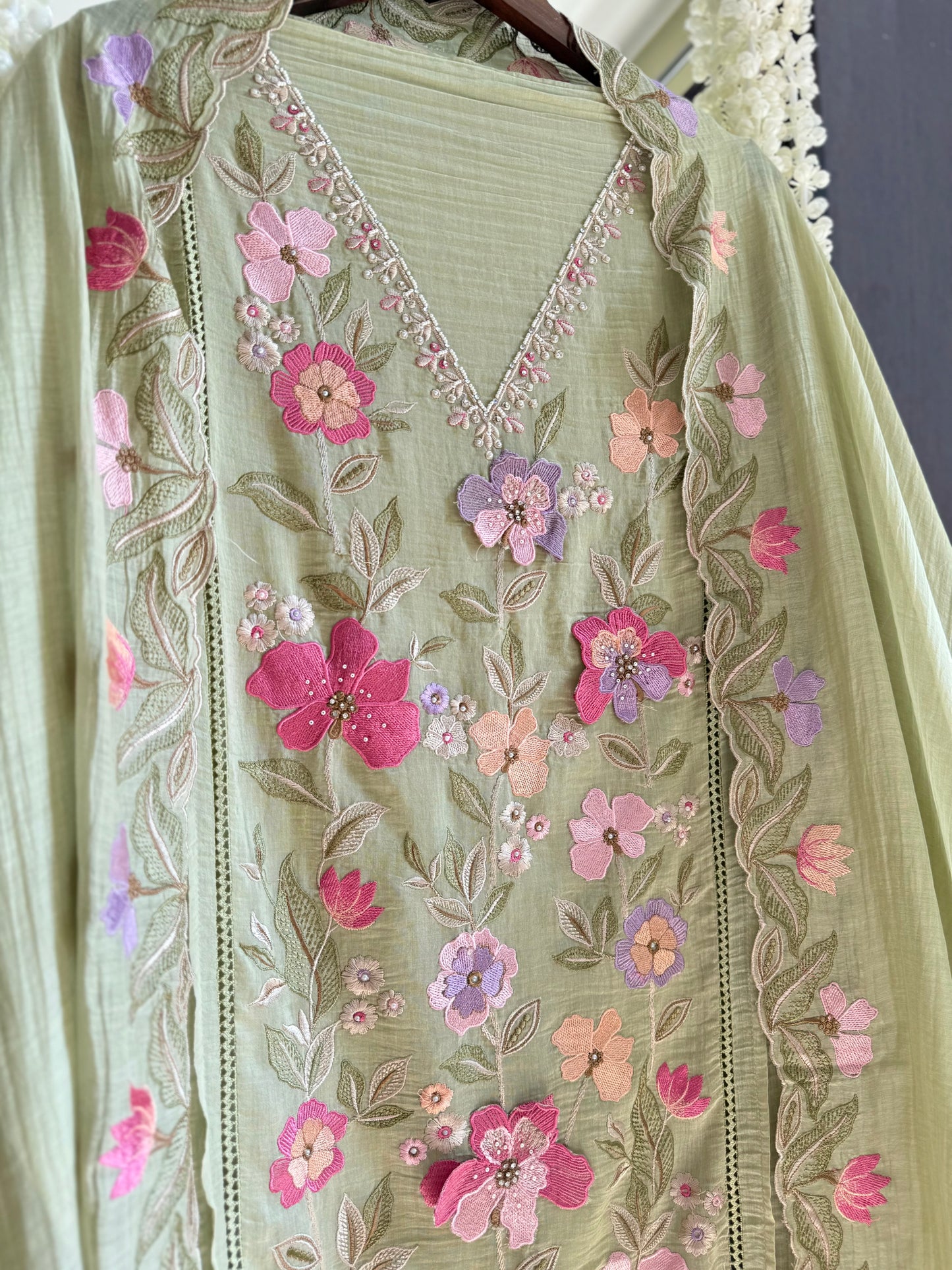 Luxurious Mul chanderi appliqué work floral suit