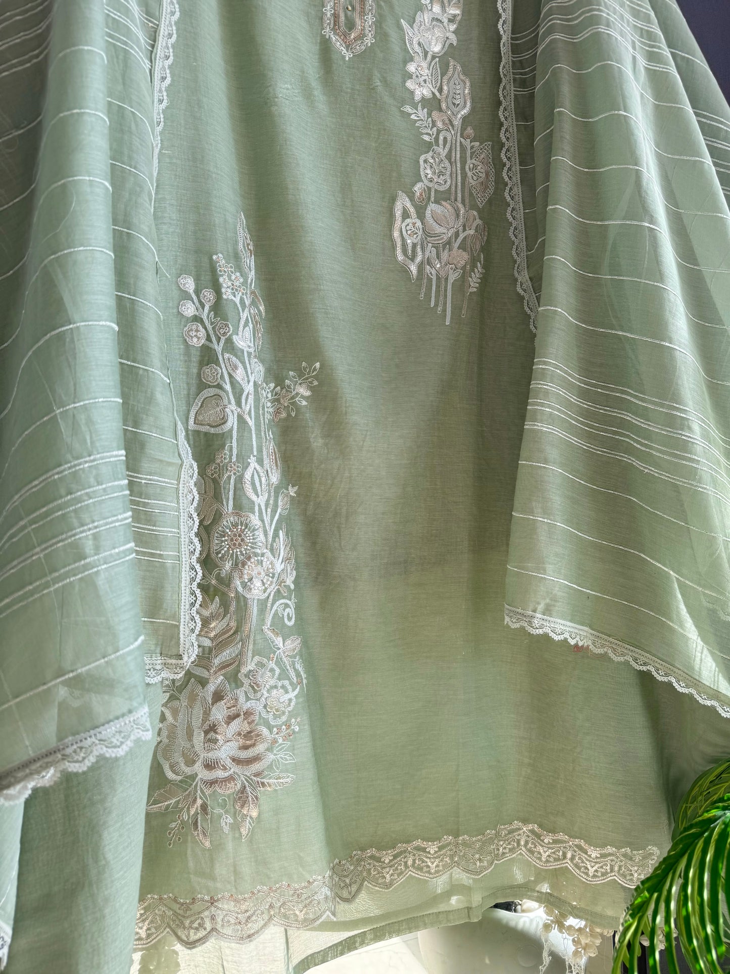 Luxurious Mul chanderi gold appliqué work suit