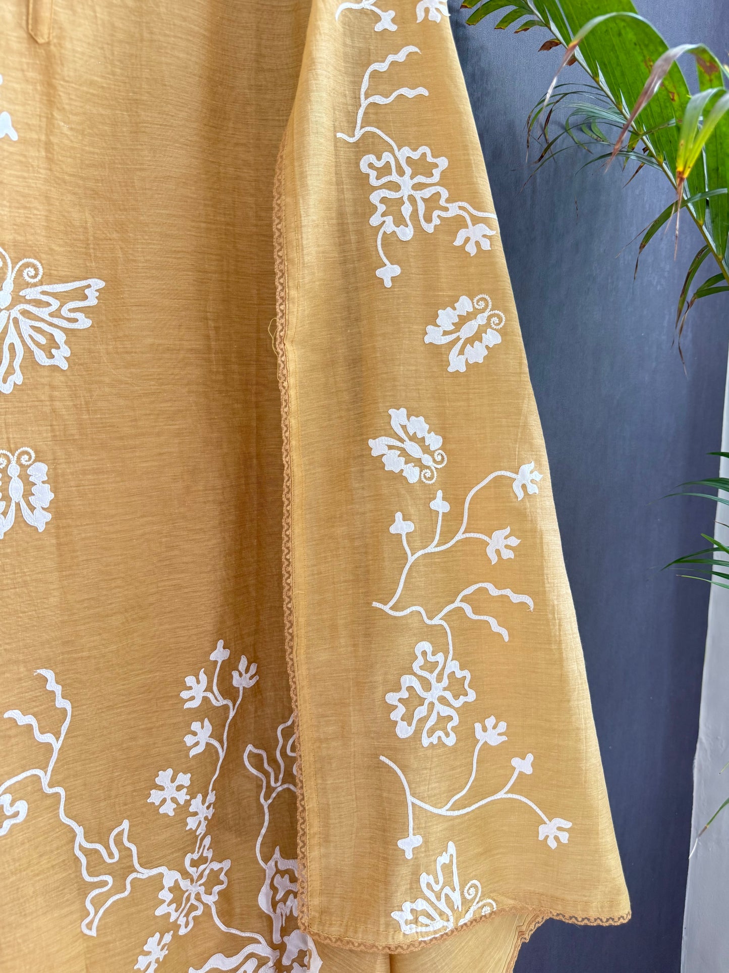 Luxurious Mul chanderi appliqué butterfly suit