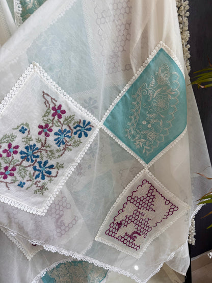Luxurious Mul chanderi cross-stitch suit