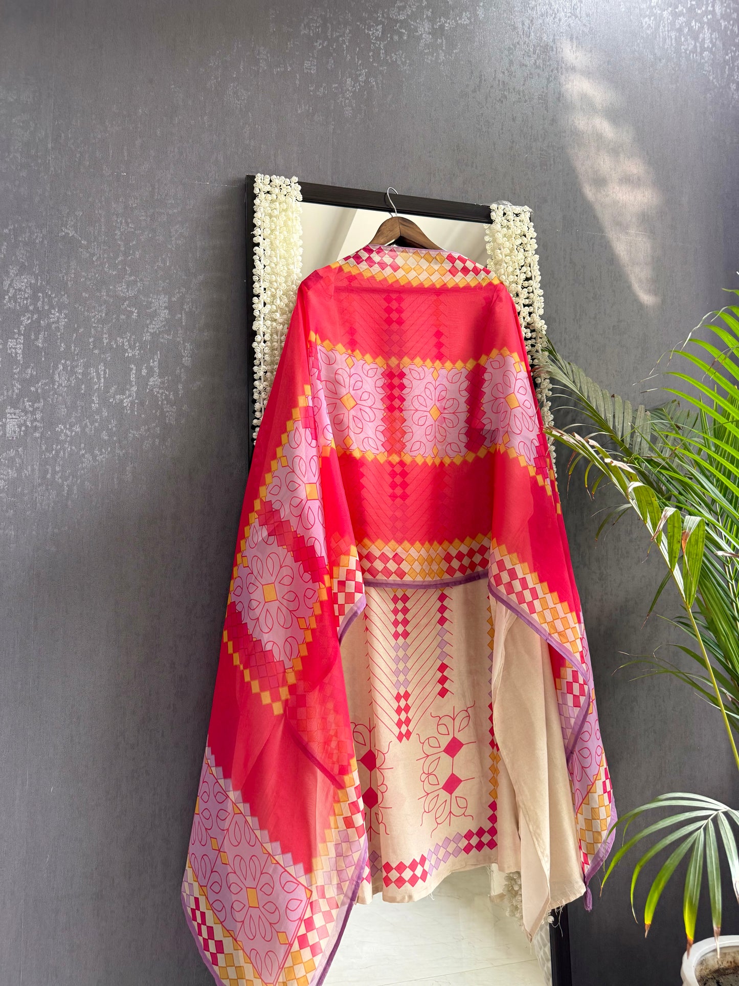Muslin ikkat inspired handwork suits