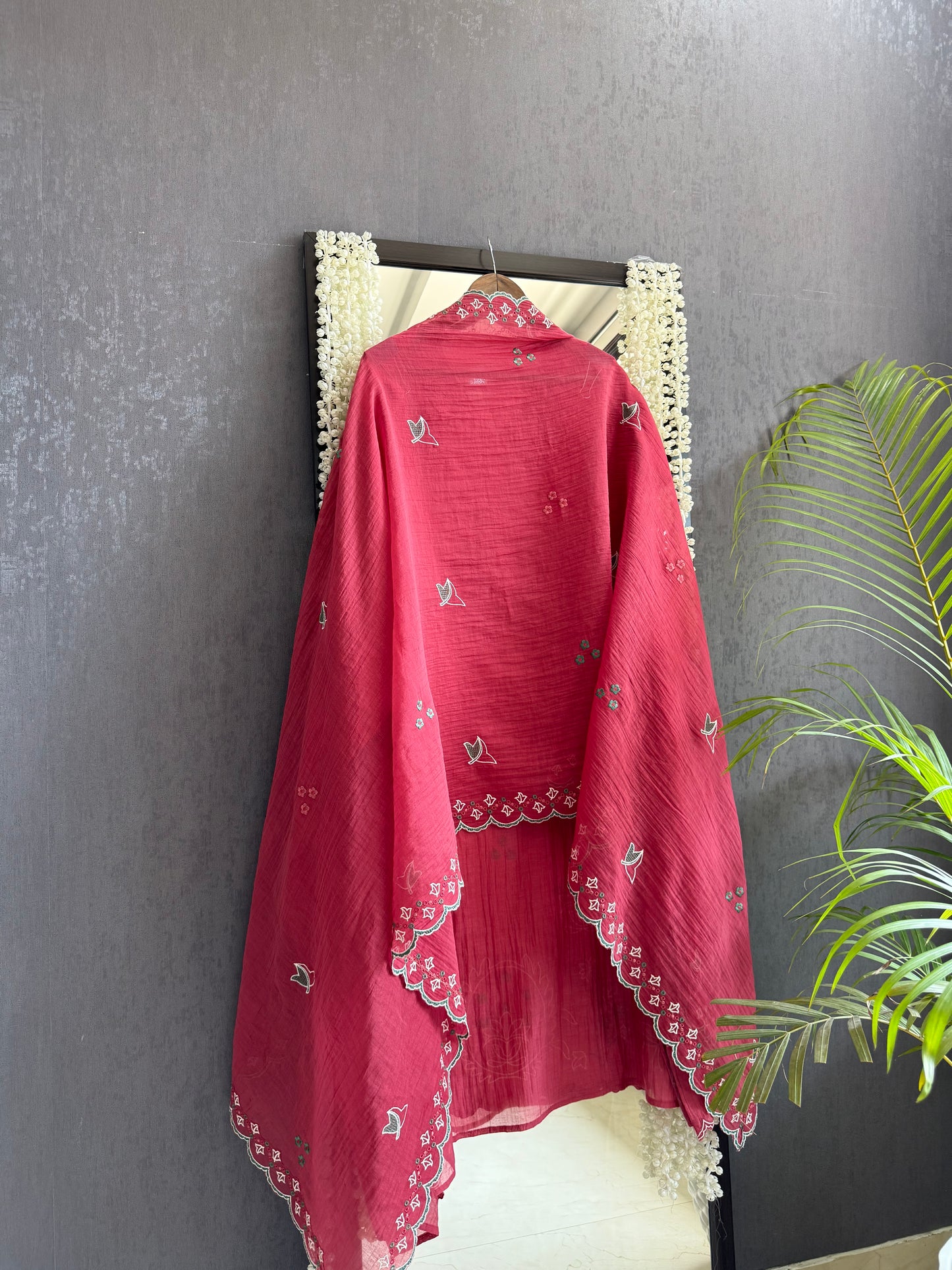 Luxurious Mul chanderi appliqué work suit