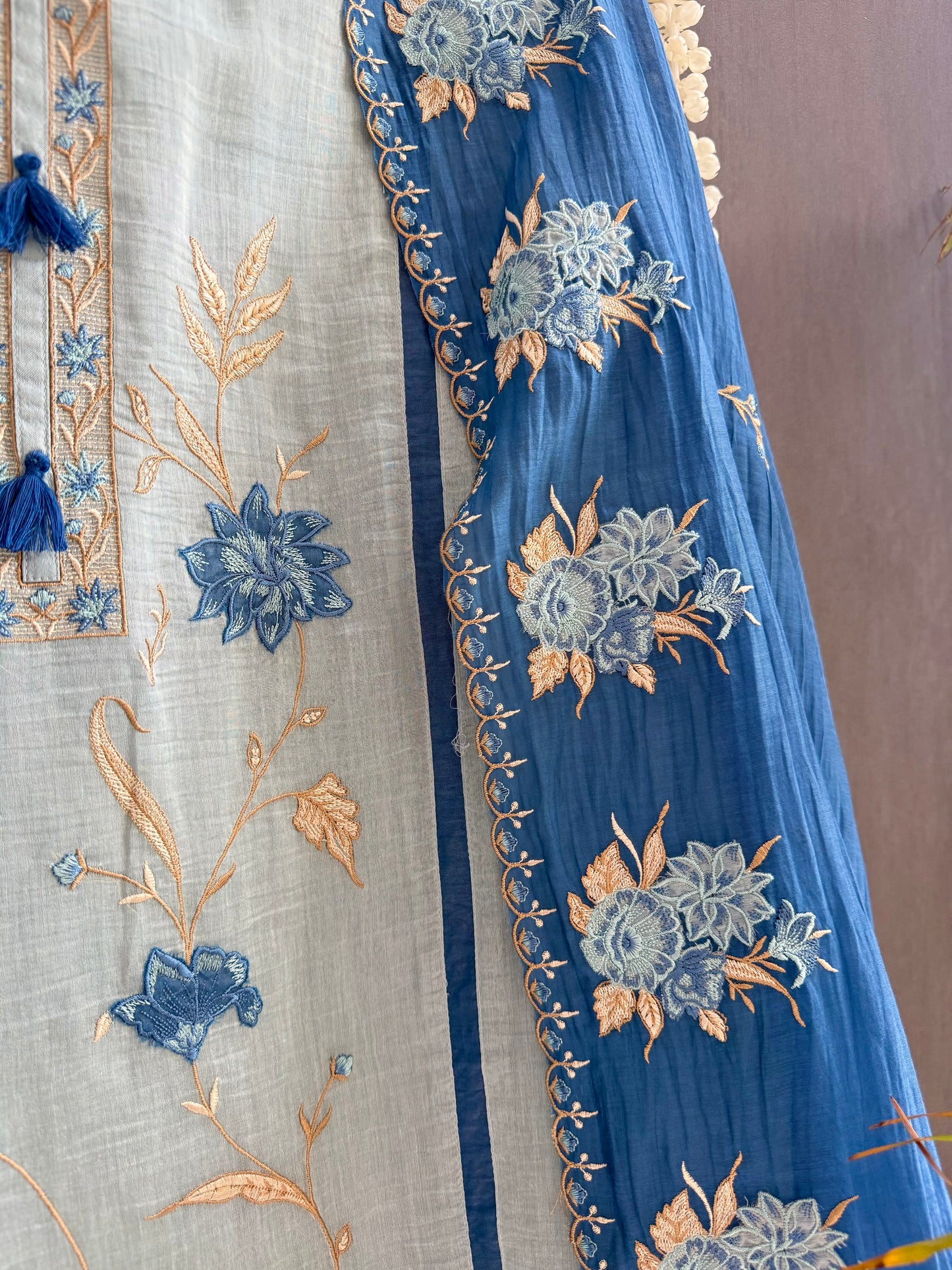 Luxurious Mul chanderi appliqué floral suit
