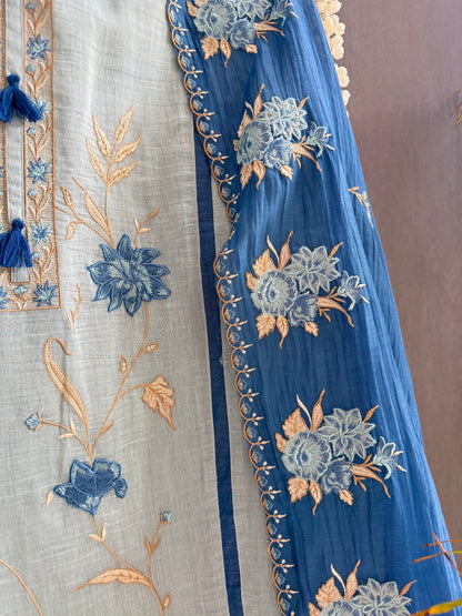 Luxurious Mul chanderi appliqué floral suit