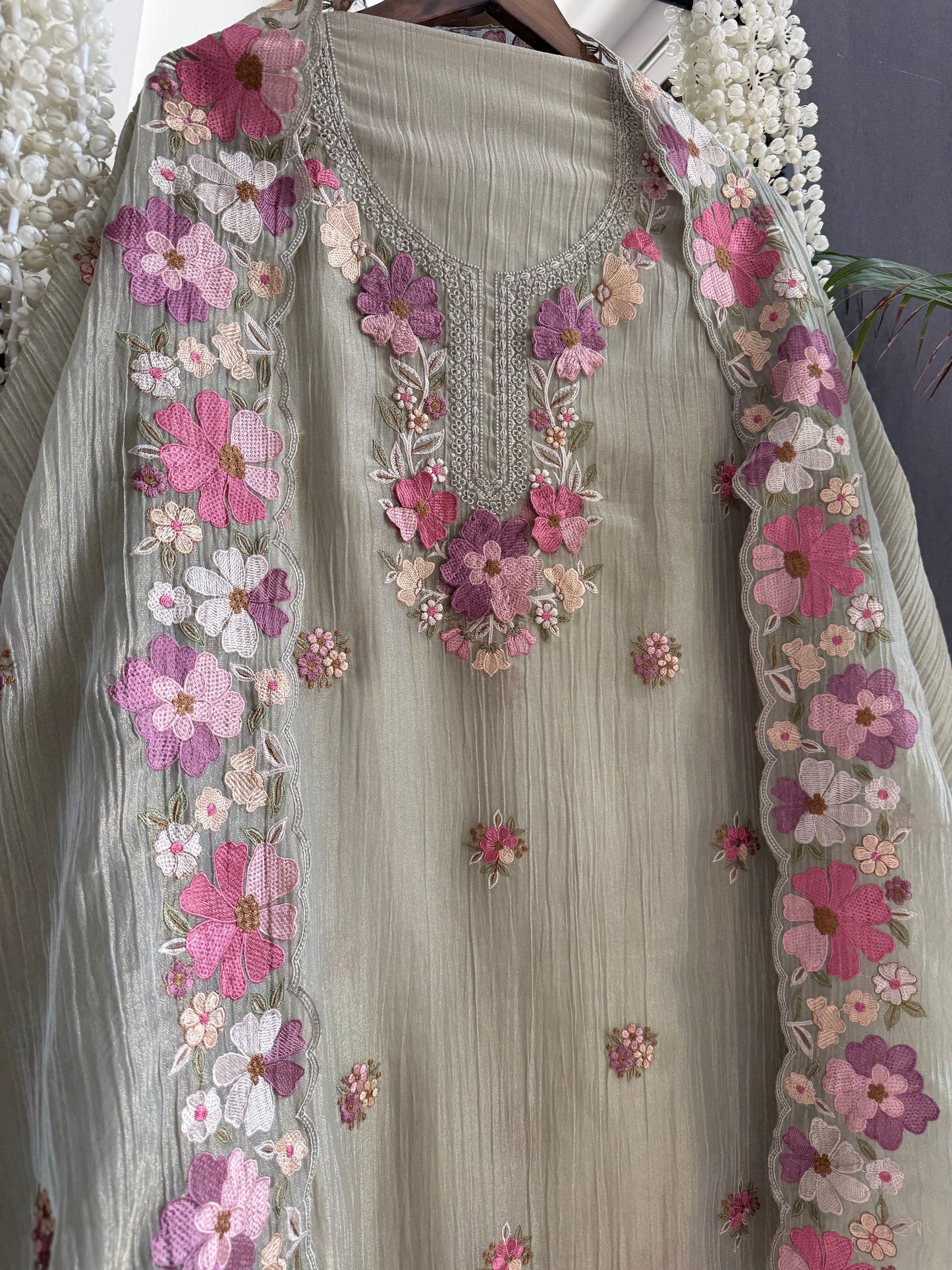 Luxurious Mul chanderi appliqué work floral suit