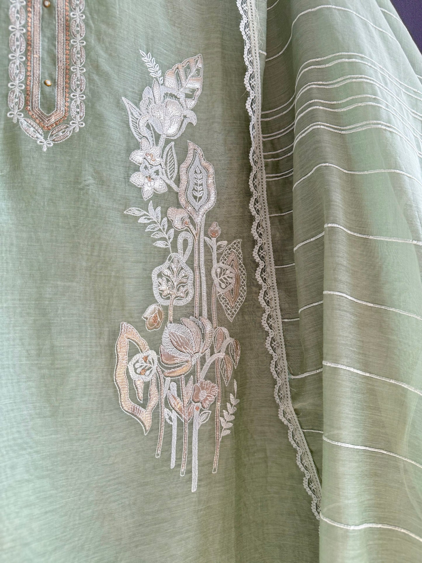 Luxurious Mul chanderi gold appliqué work suit