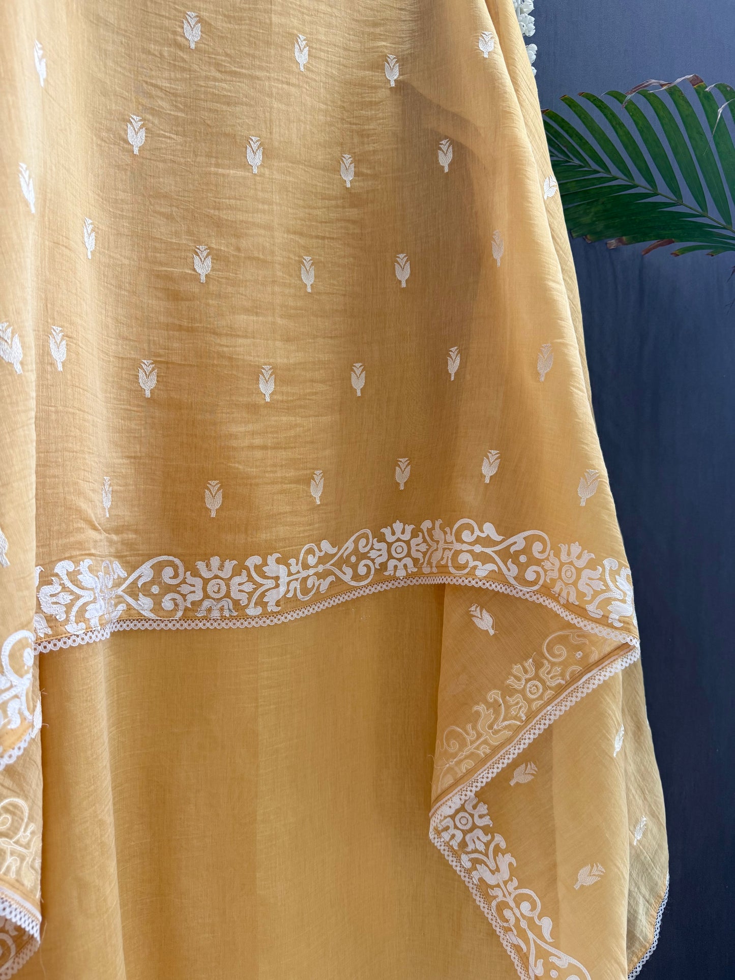 Luxurious Mul chanderi appliqué work suit