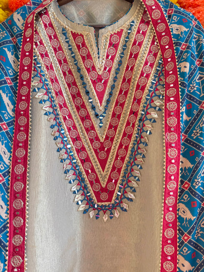 Luxurious patola crush tissue silk suit
