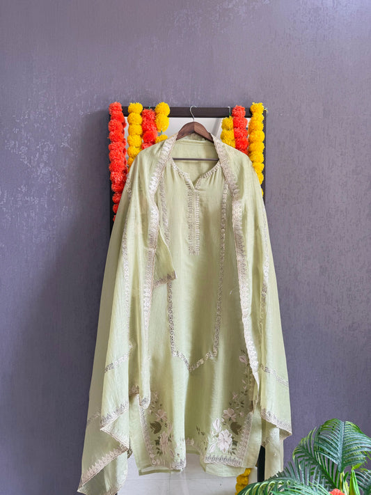 Luxurious Mul chanderi gold appliqué work suit