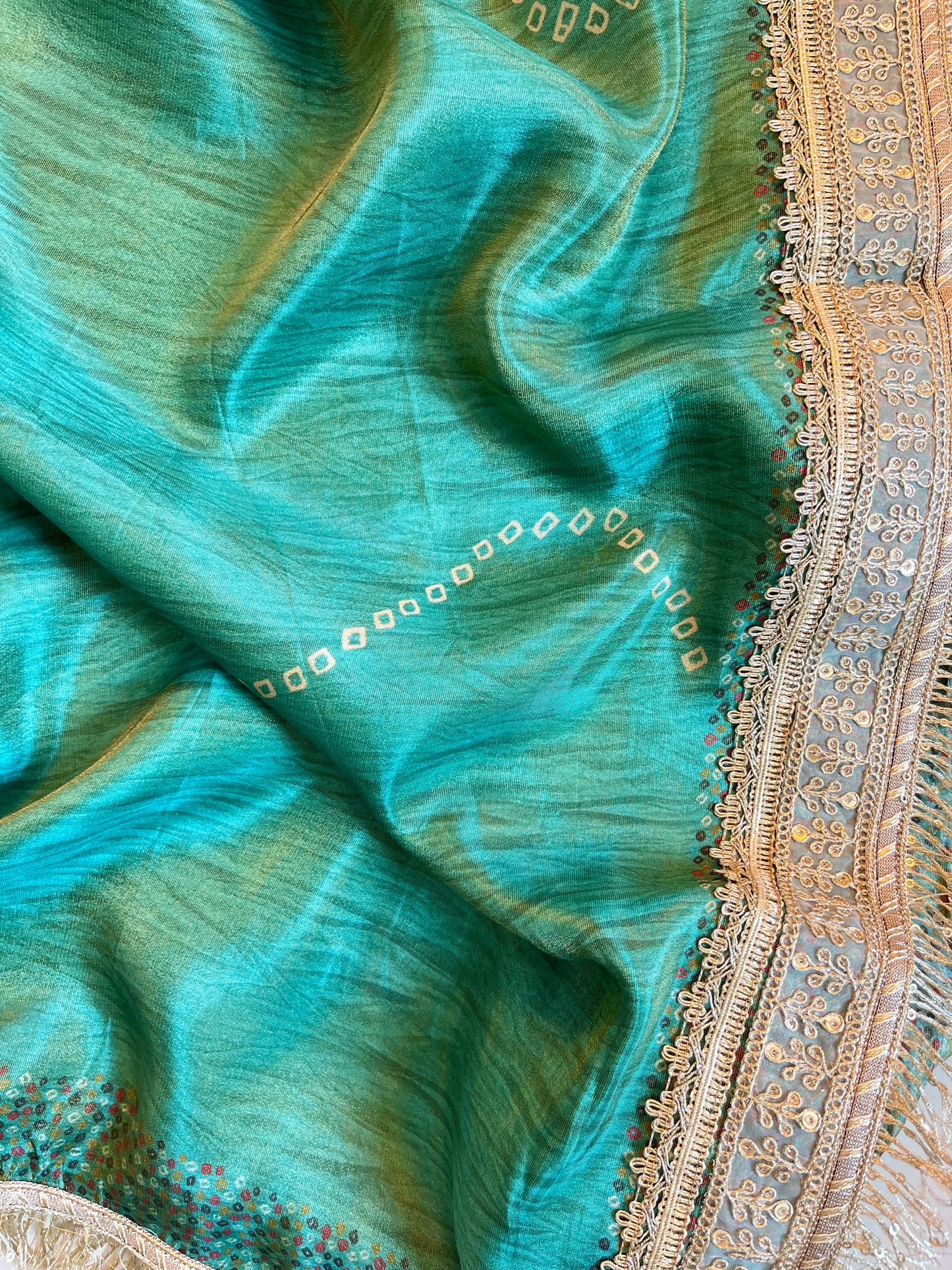 Luxurious zari woven tissue silk suit