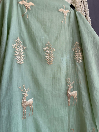 Luxurious Mul chanderi appliqué work suit