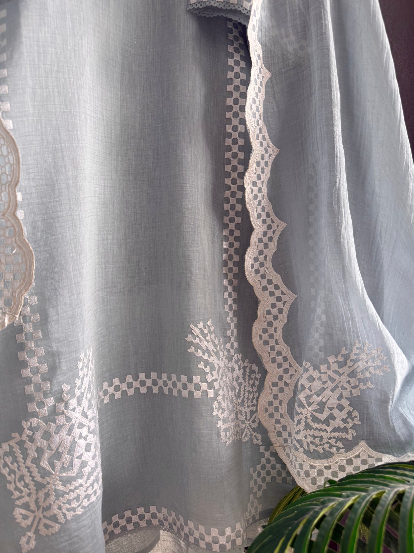 Luxurious Mul chanderi appliqué work suit