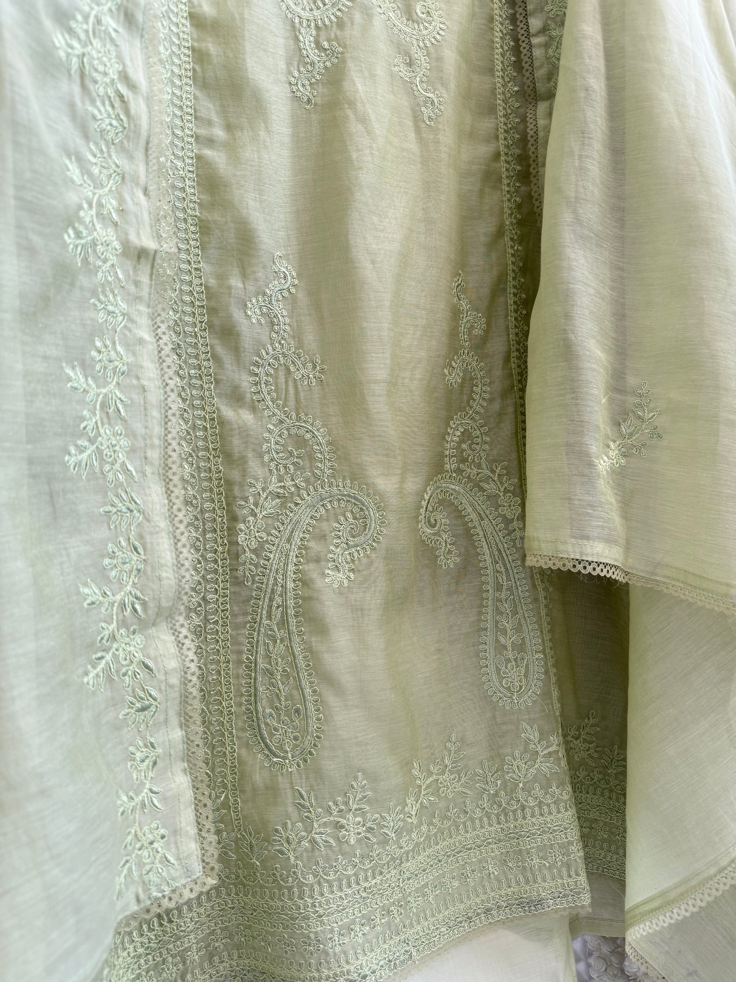 Luxurious Mul chanderi monochromatic threadwork suit
