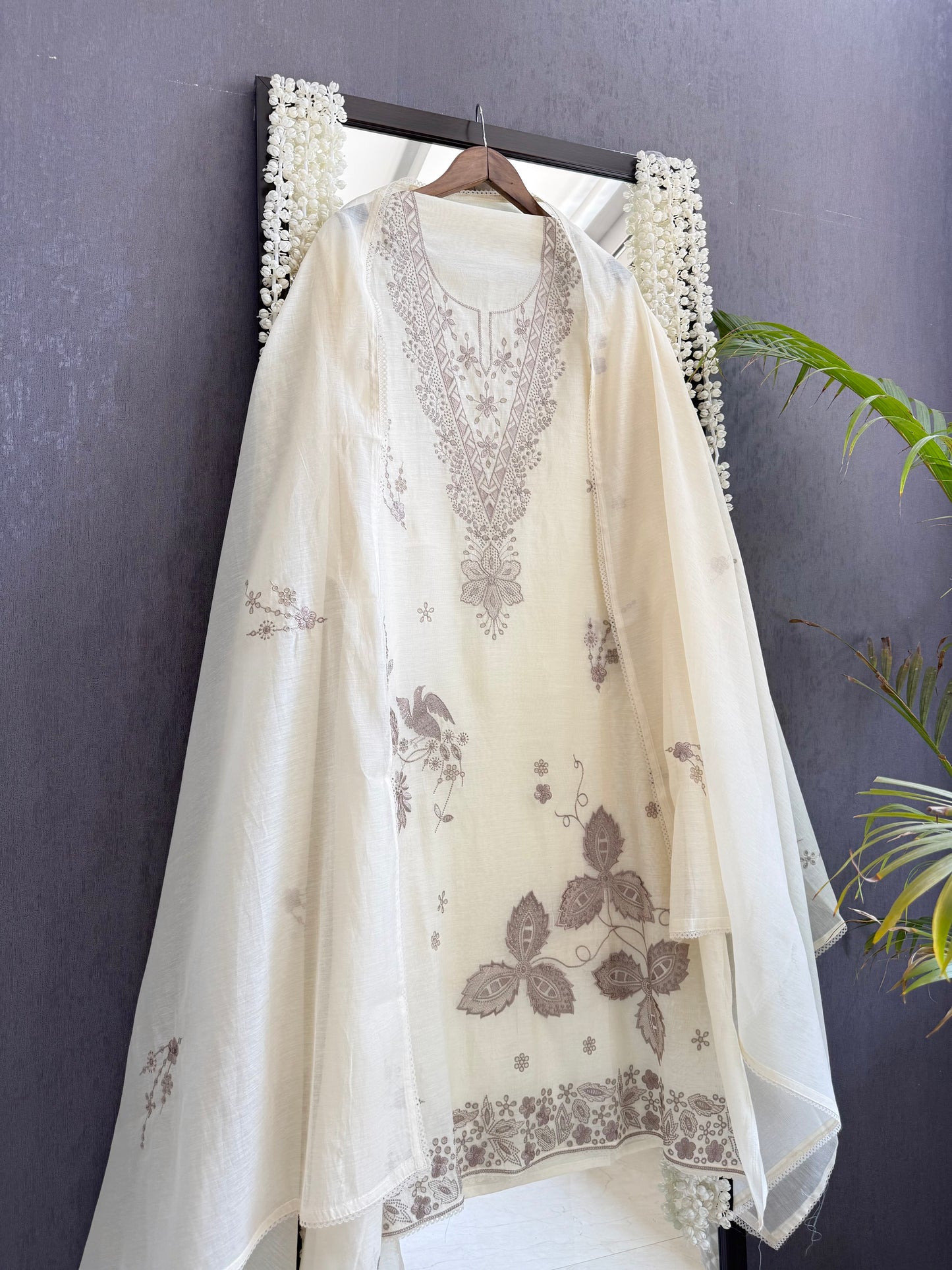 Luxurious Mul chanderi threadwork schiffili suit