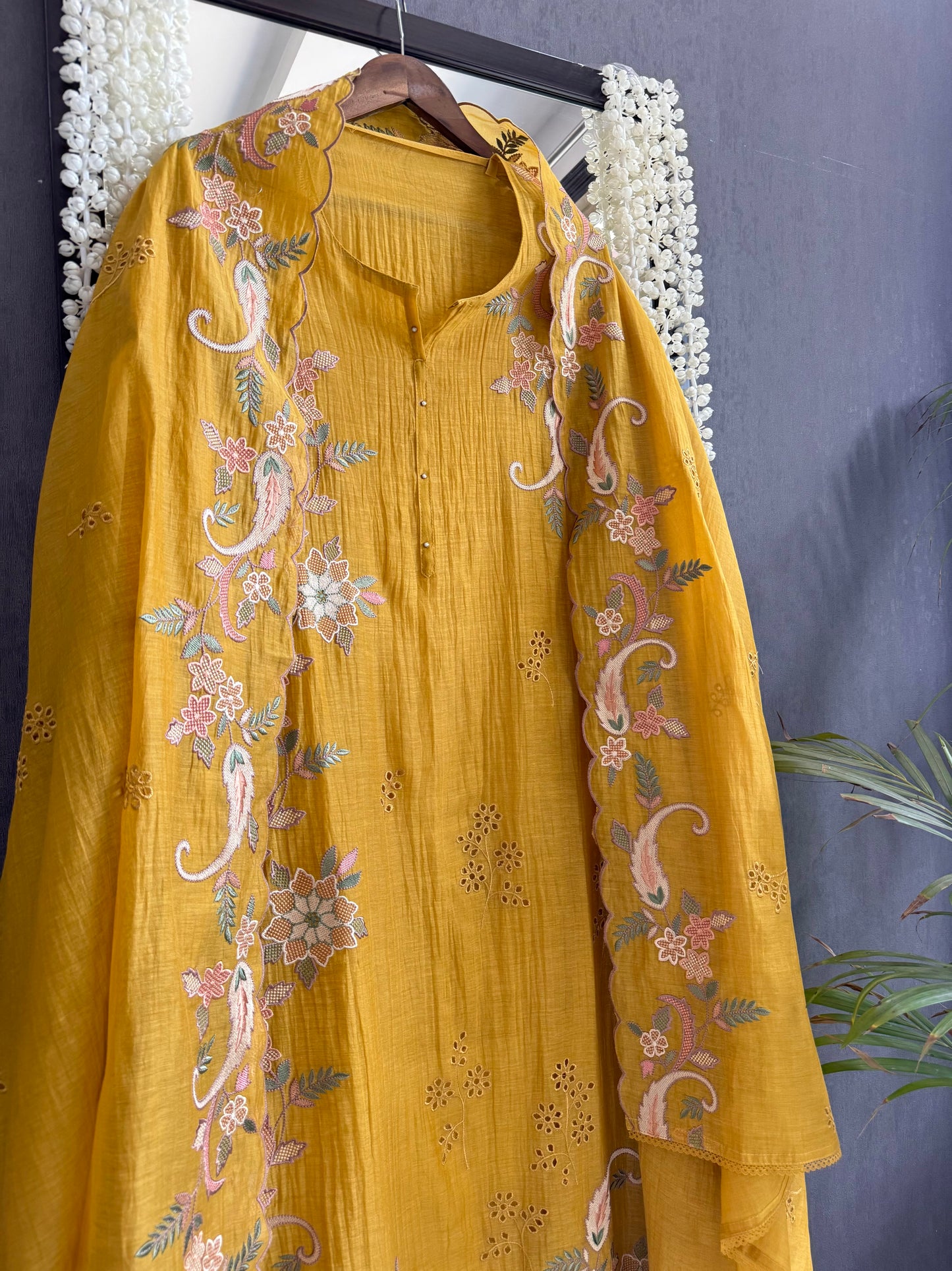 Luxurious Mul chanderi threadwork schiffili suit