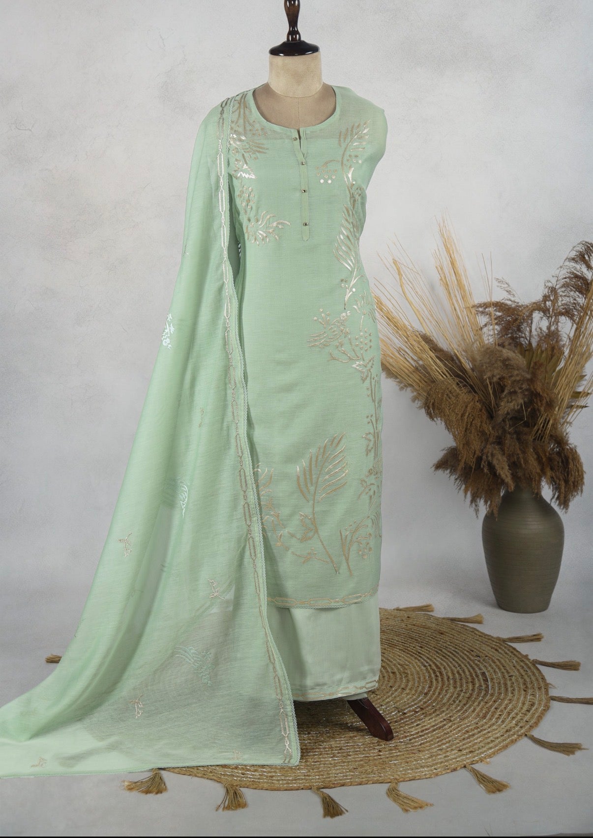 Luxurious Mul chanderi gota appliqué work suit