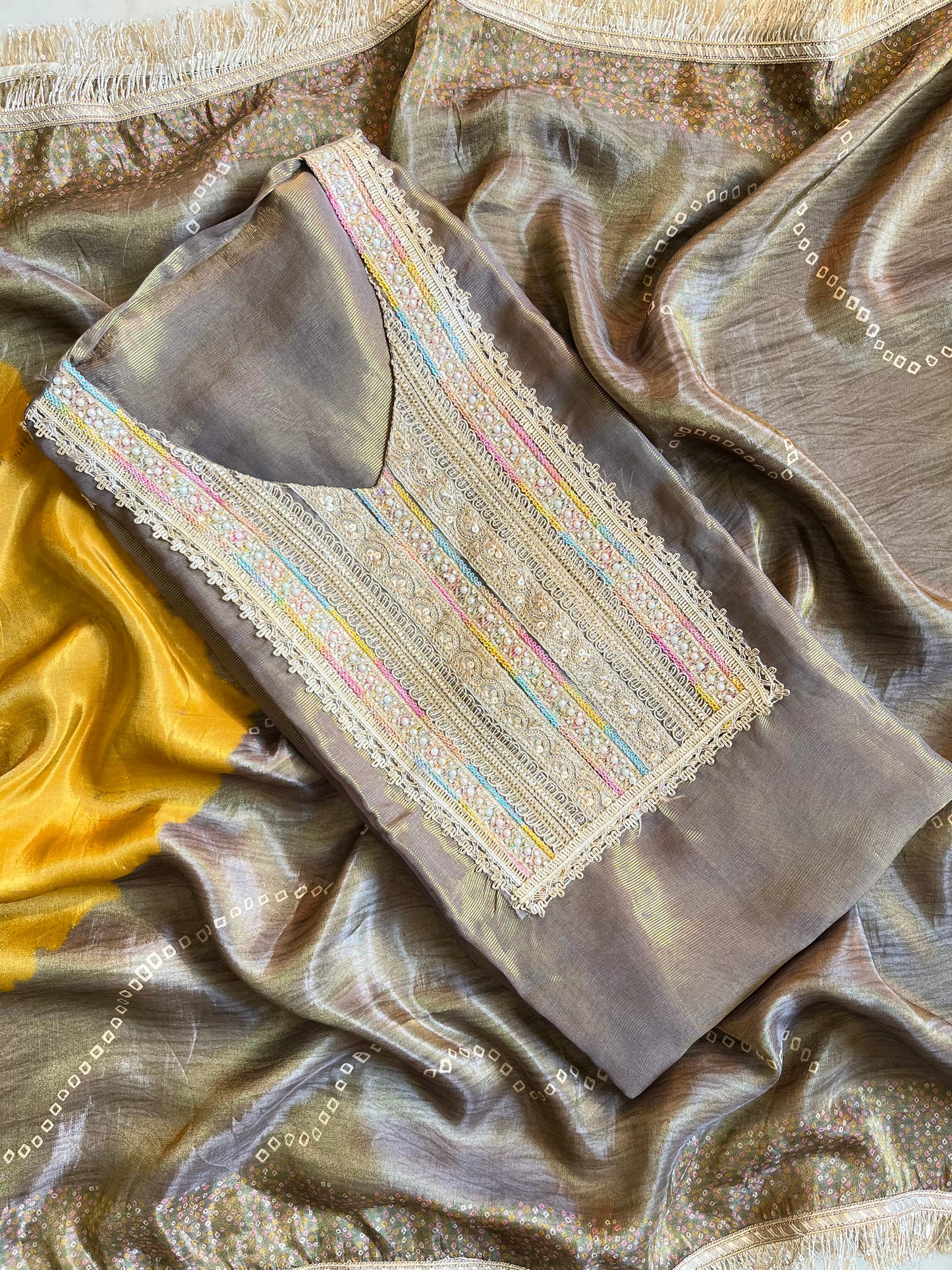 Luxurious zari woven tissue silk suit