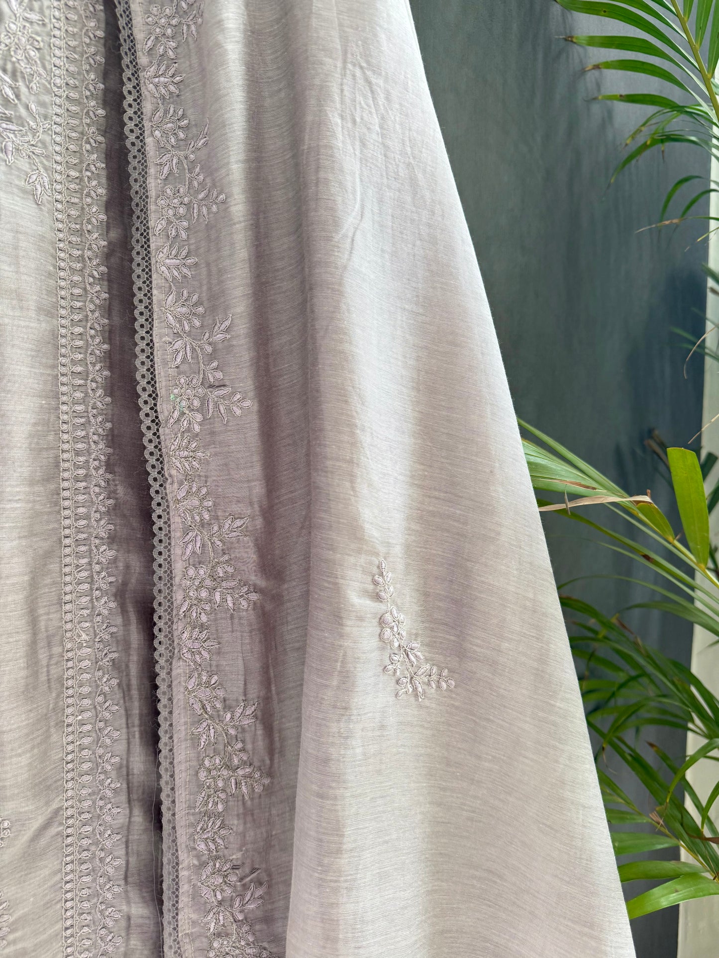 Luxurious Mul chanderi monochromatic threadwork suit