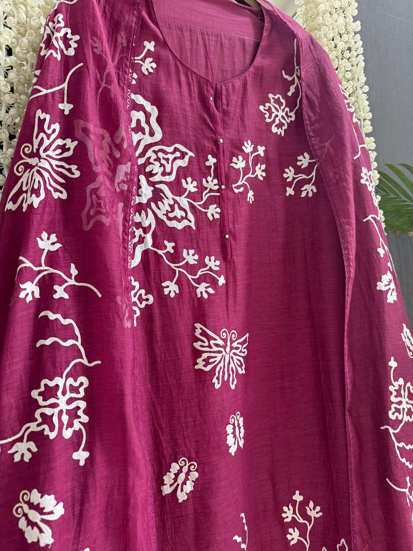 Luxurious Mul chanderi appliqué butterfly suit