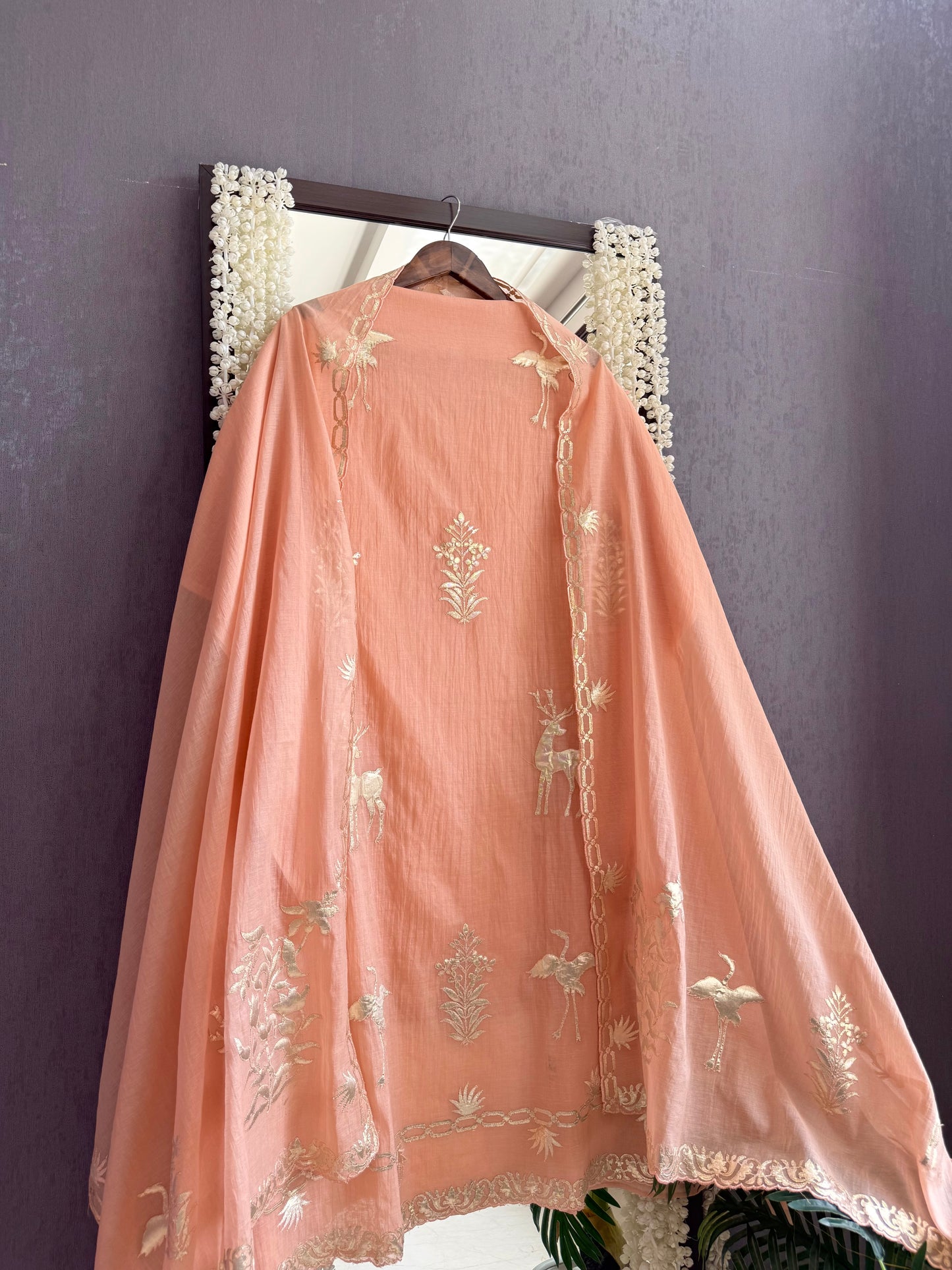 Luxurious Mul chanderi appliqué work suit