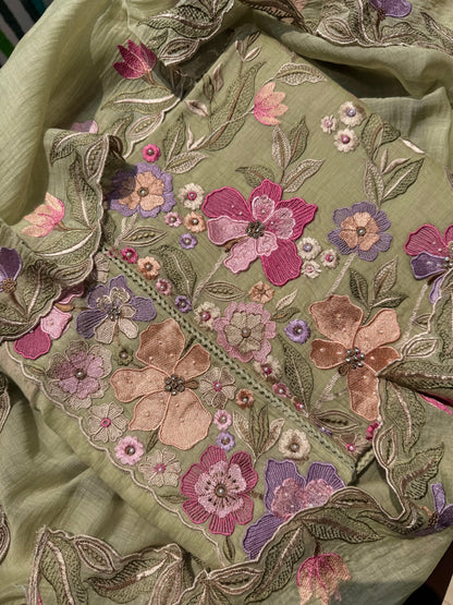 Luxurious Mul chanderi appliqué work floral suit