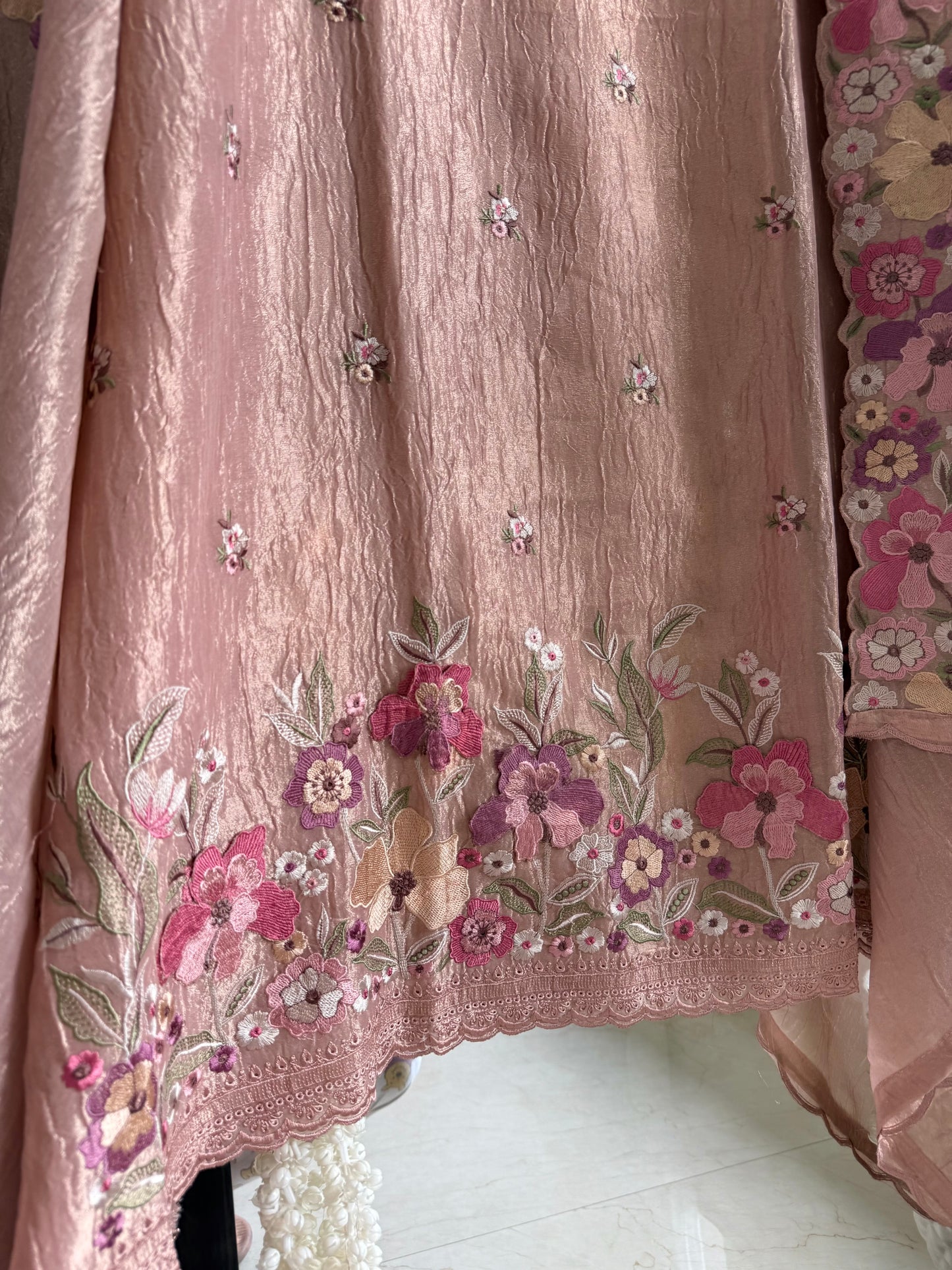 Luxurious Mul chanderi appliqué work floral suit
