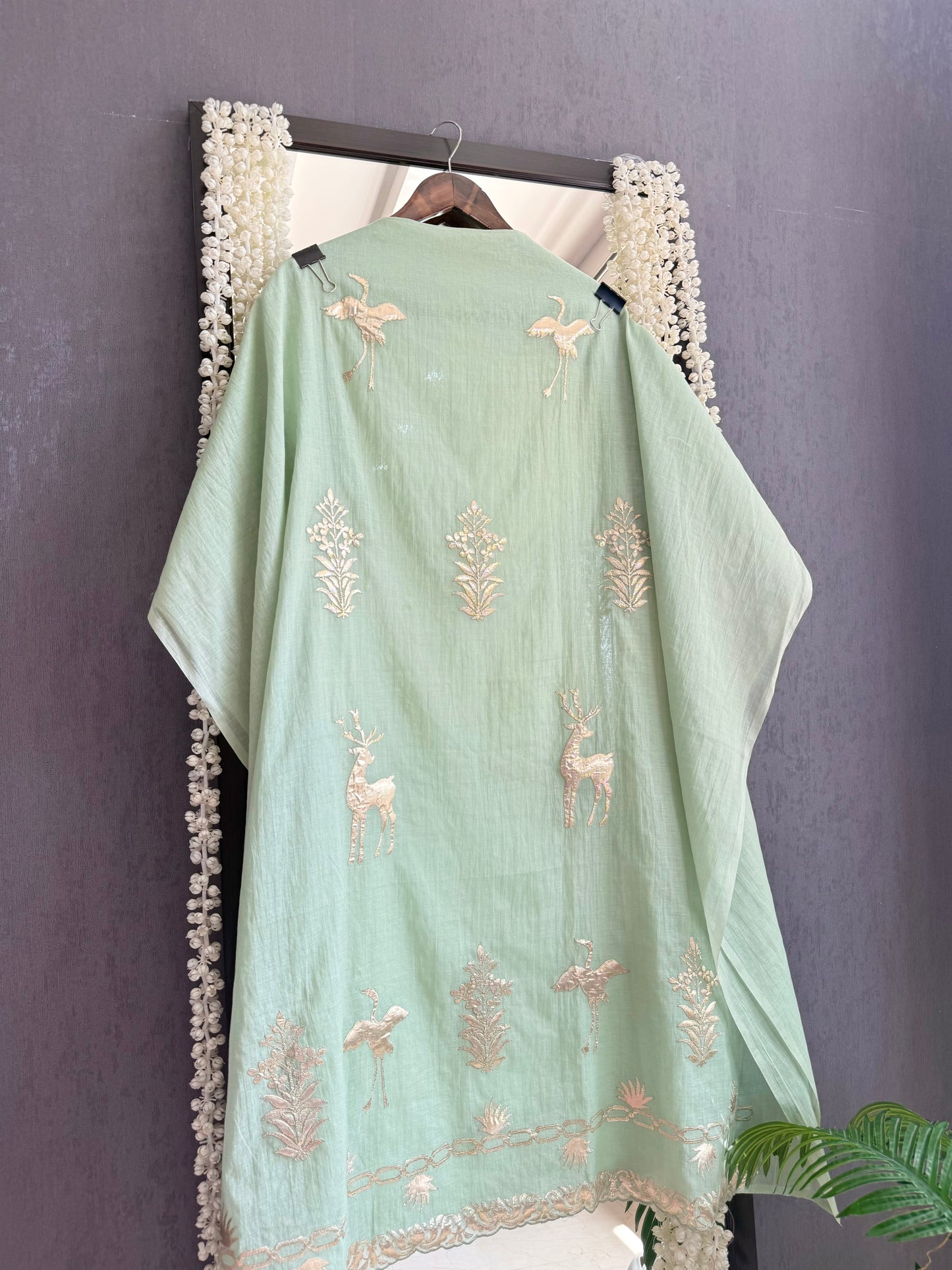 Luxurious Mul chanderi appliqué work suit