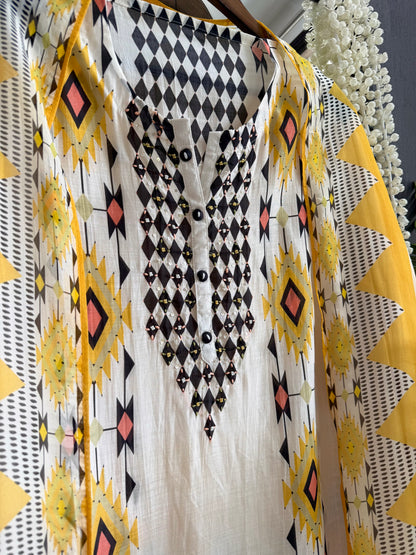 Muslin ikkat inspired handwork suits