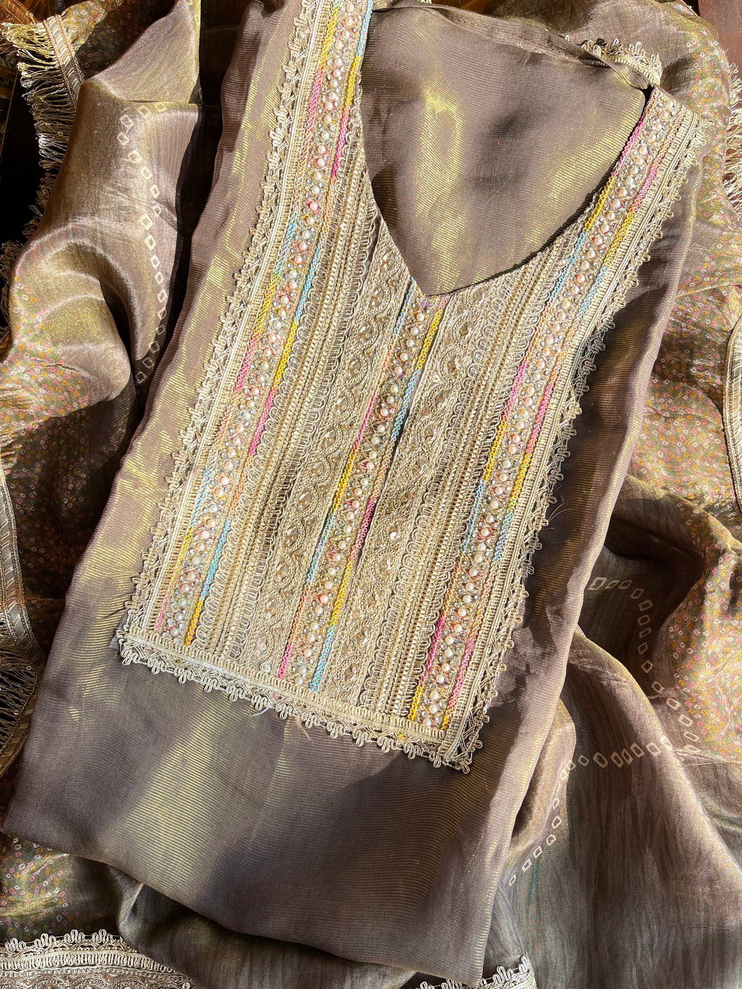 Luxurious zari woven tissue silk suit