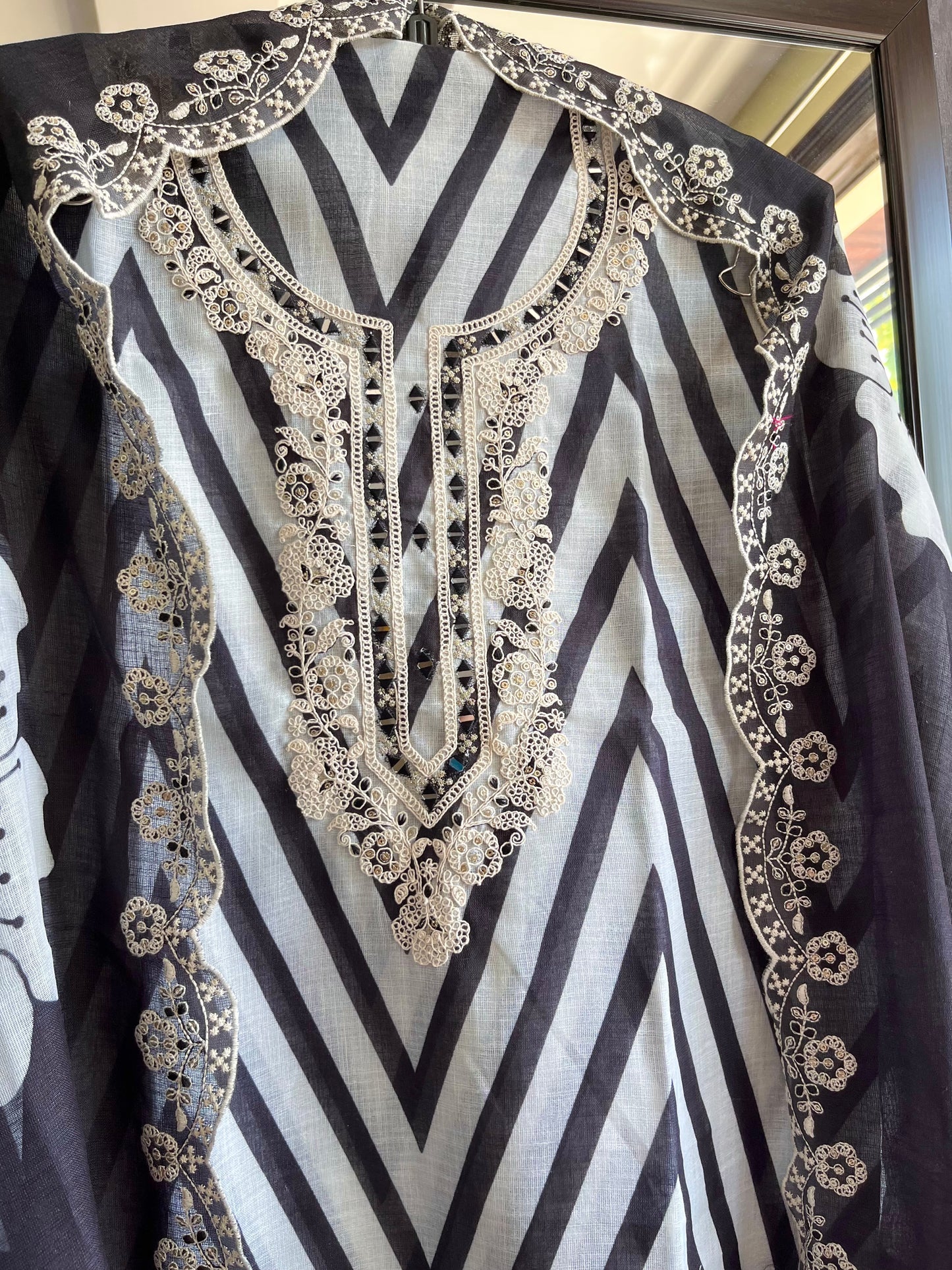 Aari work premium linen suits