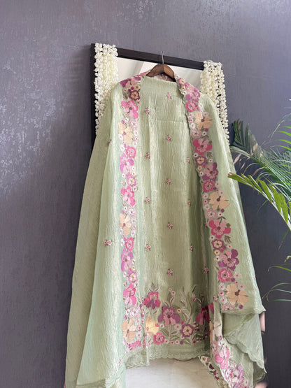Luxurious Mul chanderi appliqué work floral suit