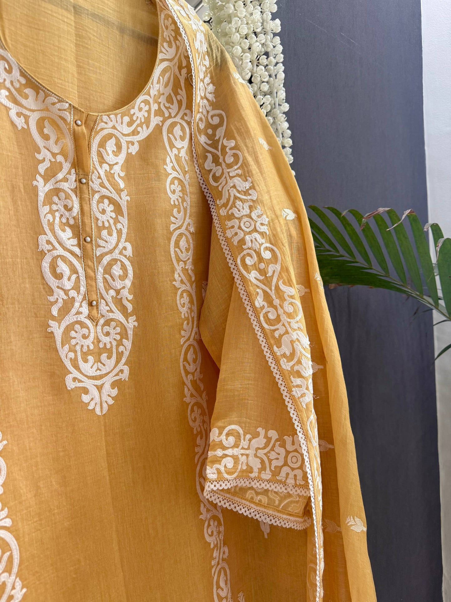 Luxurious Mul chanderi appliqué work suit